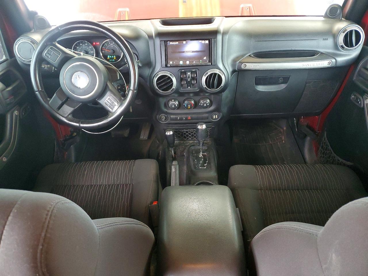 2012 Jeep Wrangler Unlimited Sport Burgundy vin: 1C4BJWDG9CL184177