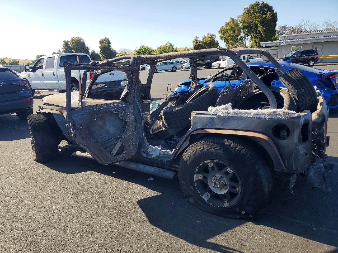 2013 Jeep Wrangler Unlimited Sport Burn vin: 1C4BJWDG9DL680582