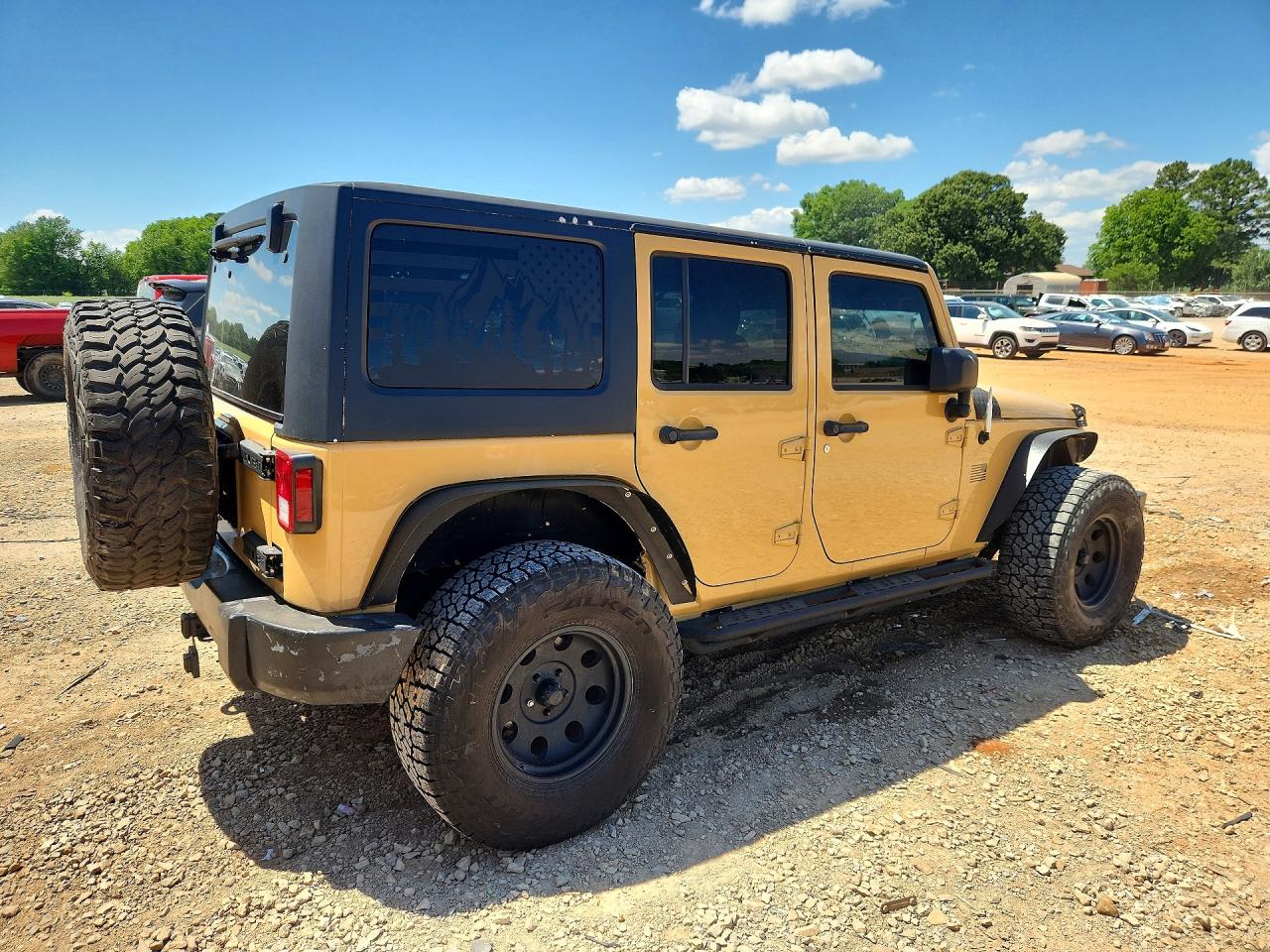 2014 Jeep Wrangler Unlimited Sport Tan vin: 1C4BJWDG9EL215947