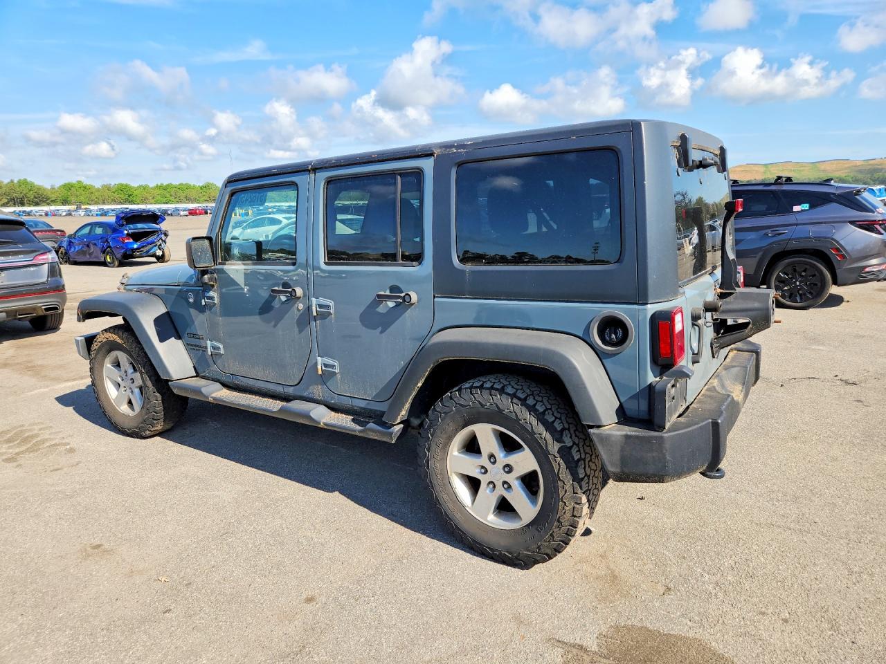2015 Jeep Wrangler Unlimited Sport Серый vin: 1C4BJWDG9FL556539
