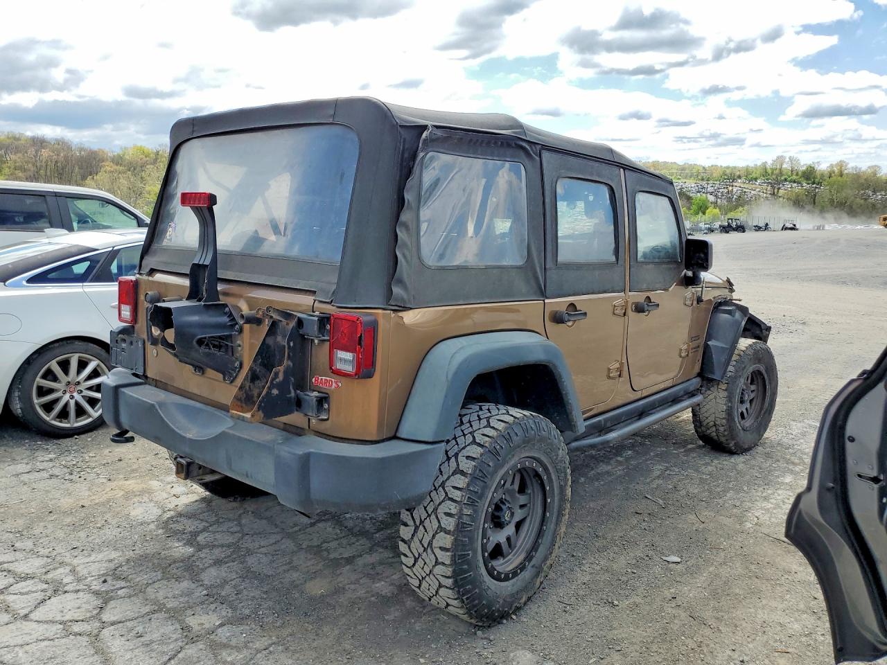 2015 Jeep Wrangler Unlimited Sport Brown vin: 1C4BJWDG9FL640859