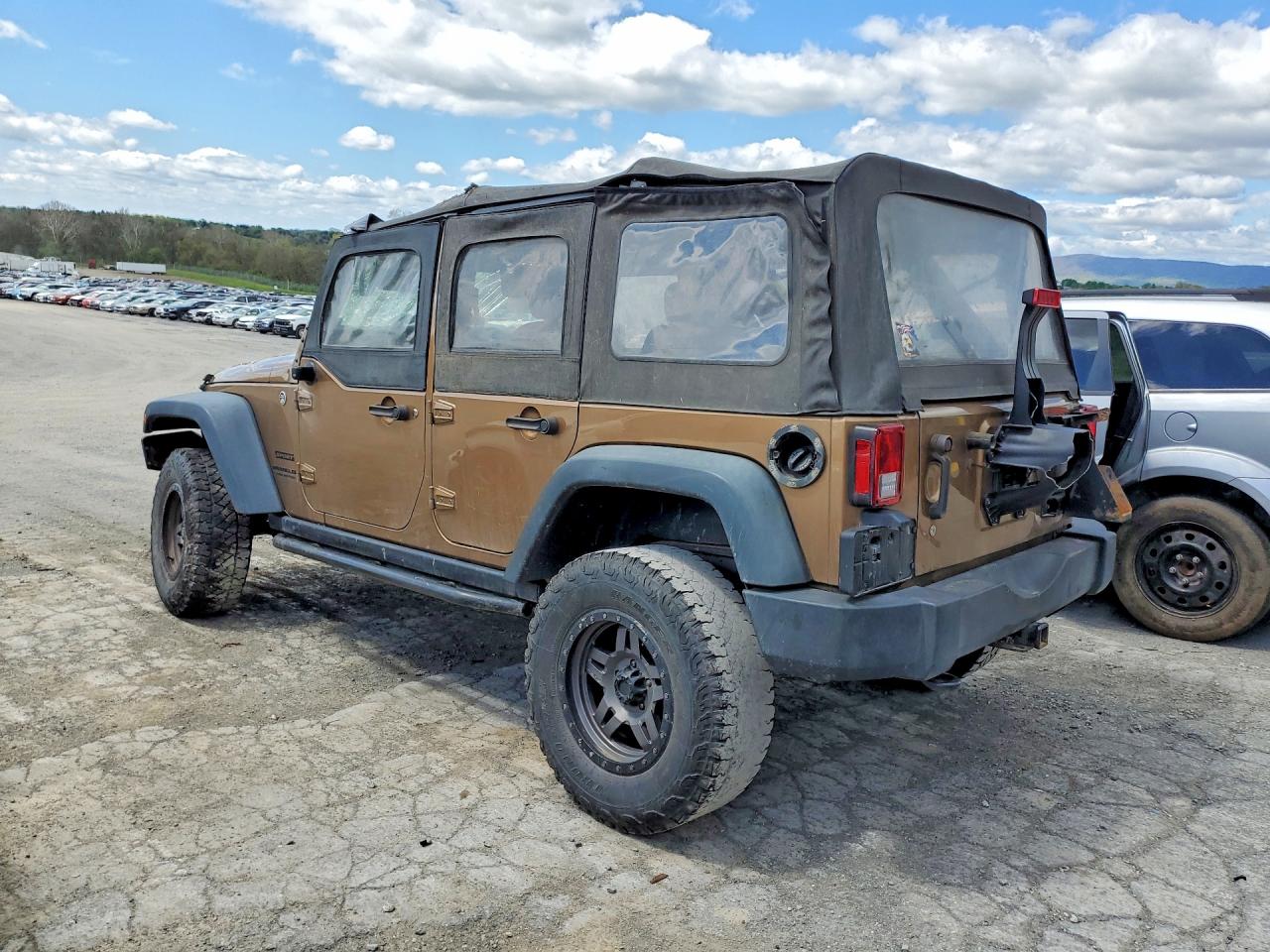 2015 Jeep Wrangler Unlimited Sport Brown vin: 1C4BJWDG9FL640859