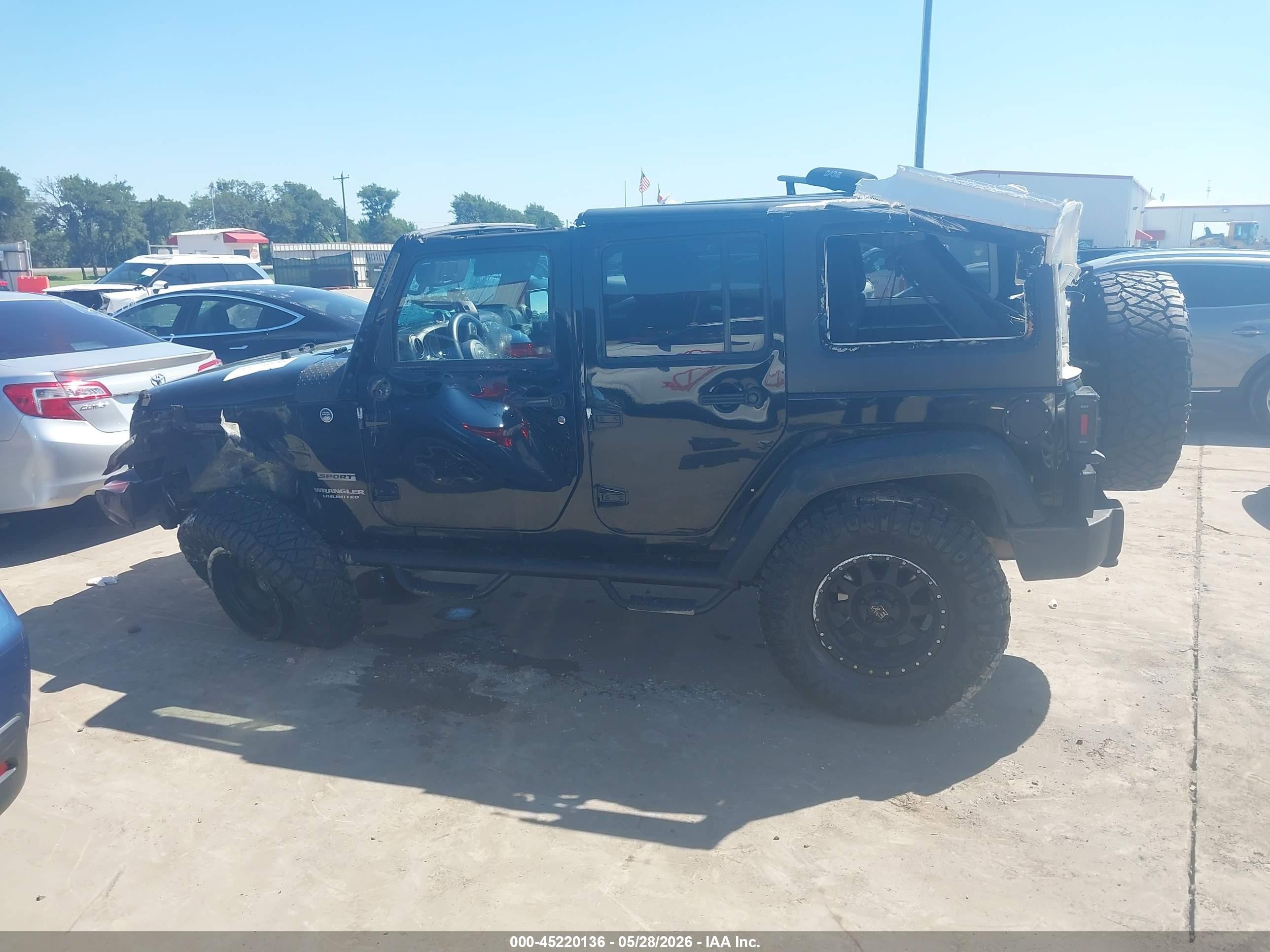 2015 Jeep Wrangler Unlimited Sport Black vin: 1C4BJWDG9FL742274