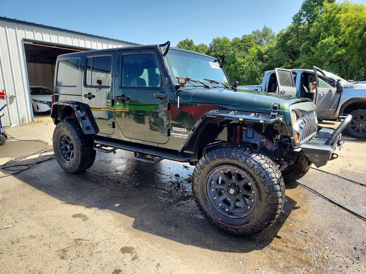 2012 Jeep Wrangler Unlimited Sport Green vin: 1C4BJWDGXCL113120