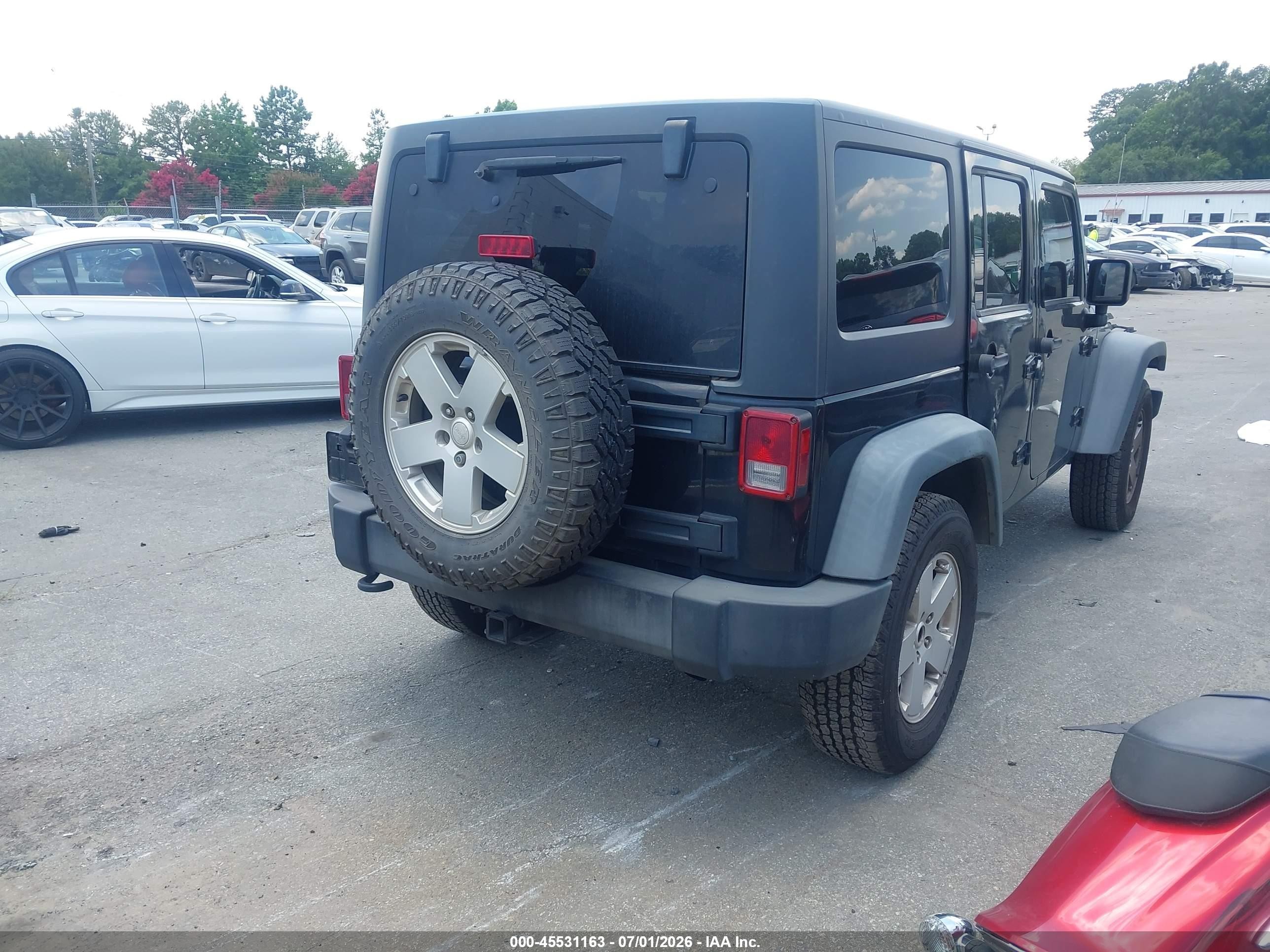 2012 Jeep Wrangler Unlimited Sport Black vin: 1C4BJWDGXCL201326