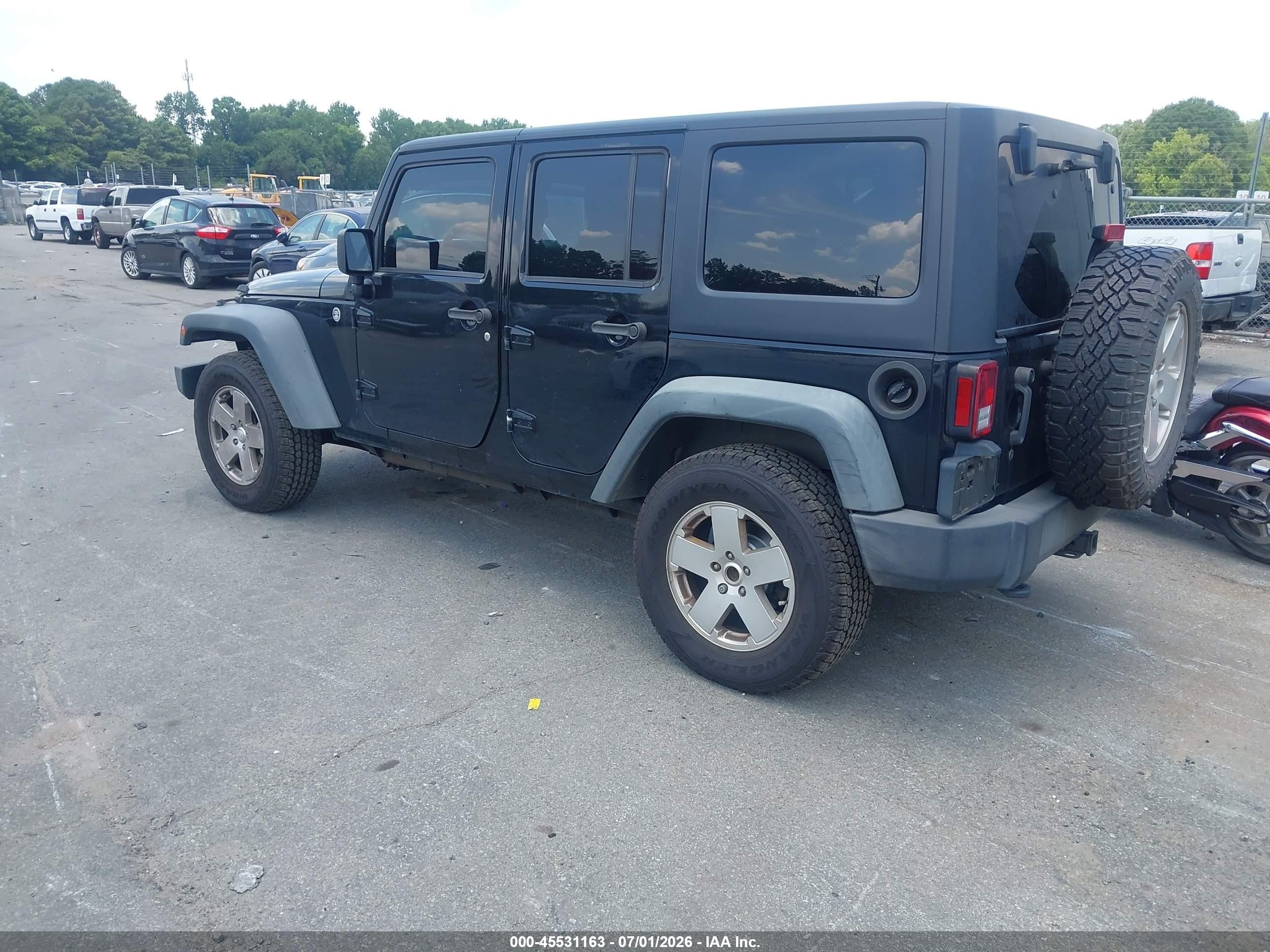 2012 Jeep Wrangler Unlimited Sport Black vin: 1C4BJWDGXCL201326