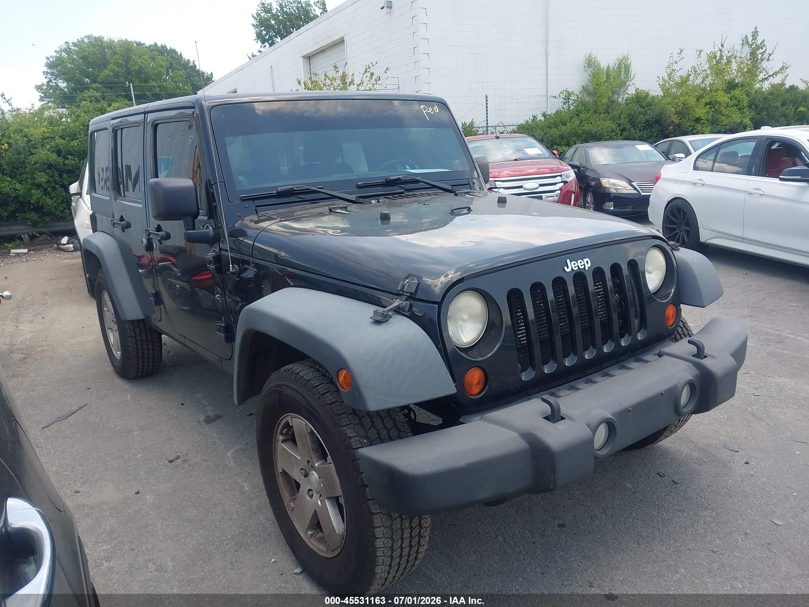 2012 Jeep Wrangler Unlimited Sport Black vin: 1C4BJWDGXCL201326