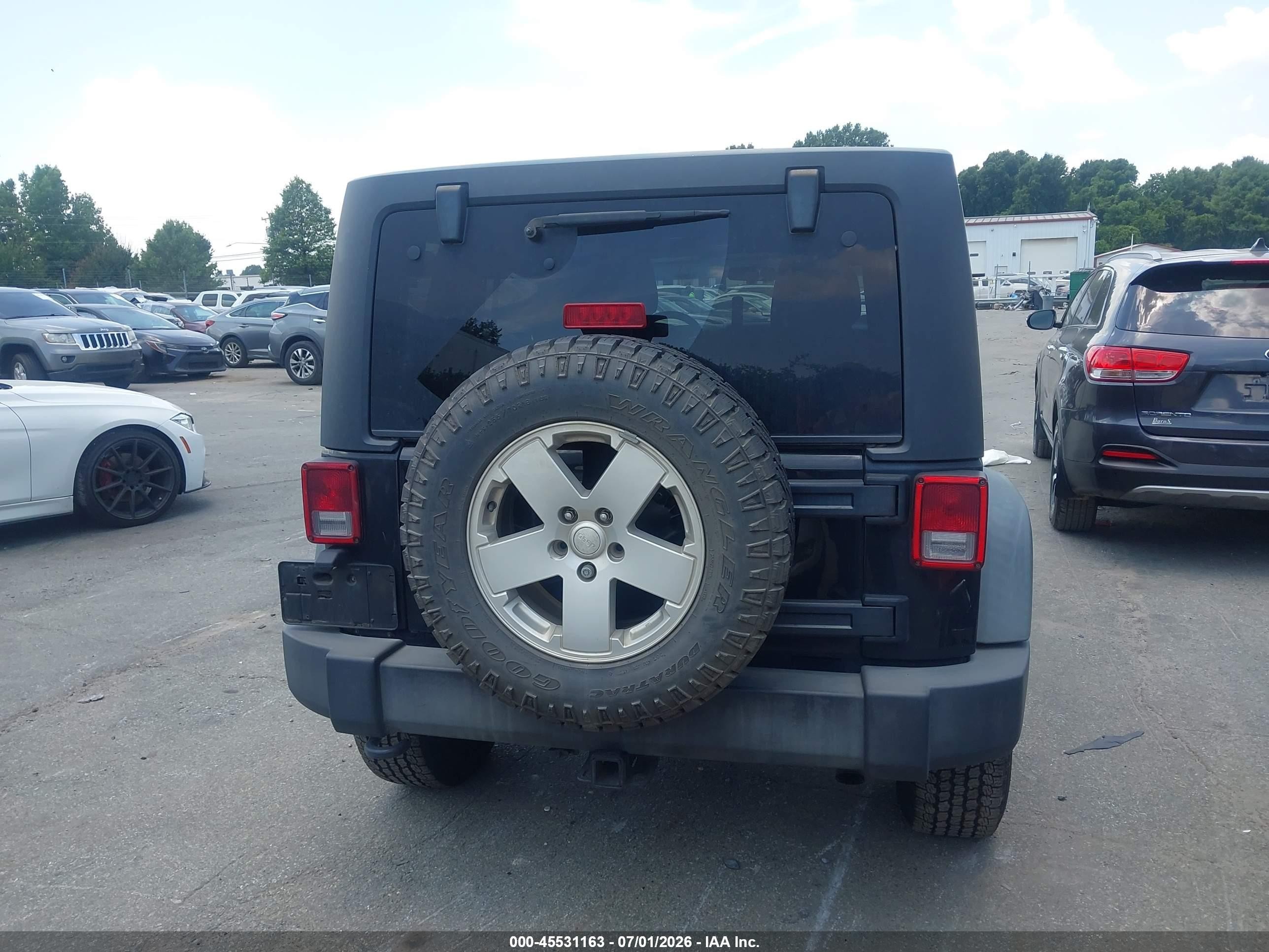 2012 Jeep Wrangler Unlimited Sport Black vin: 1C4BJWDGXCL201326