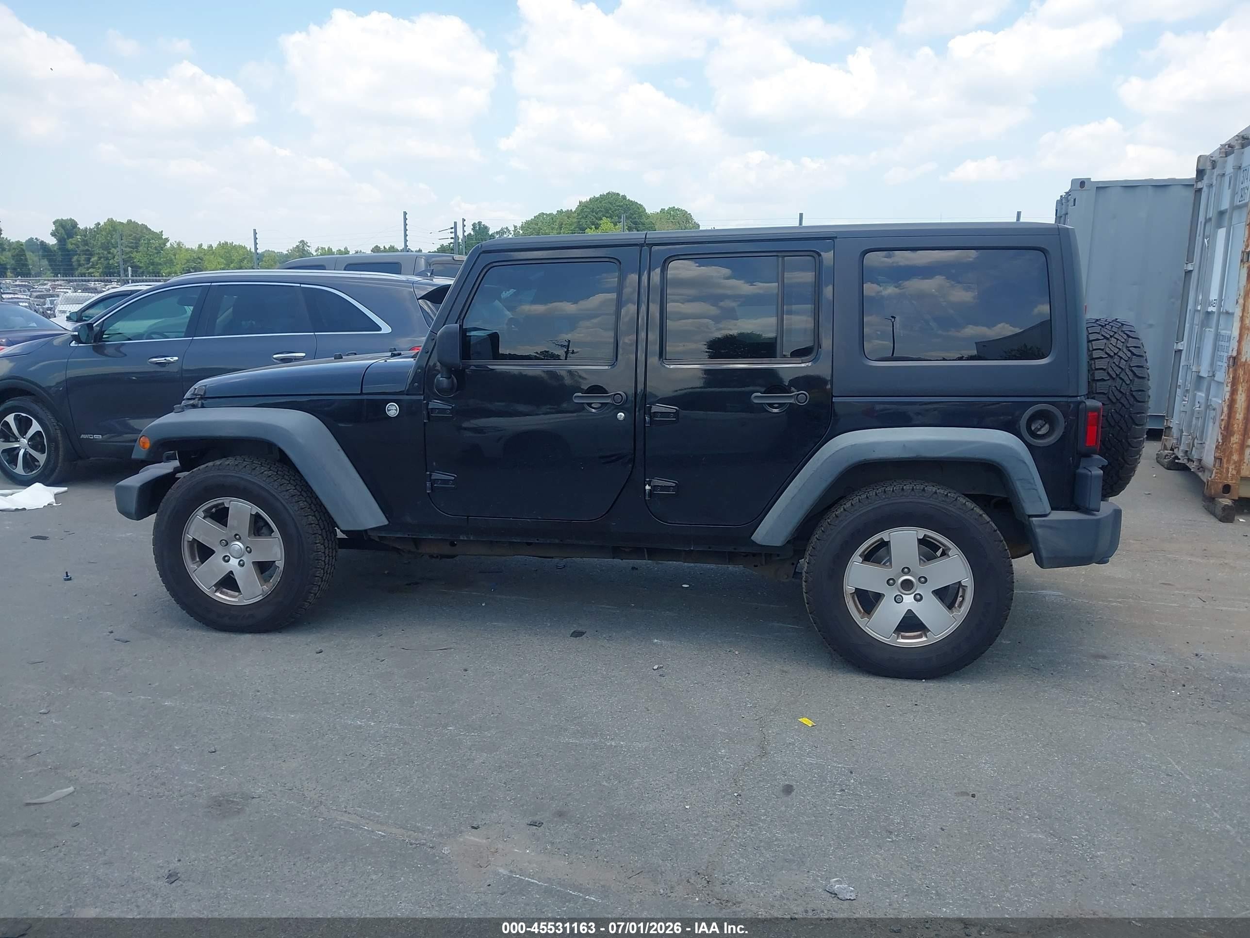 2012 Jeep Wrangler Unlimited Sport Black vin: 1C4BJWDGXCL201326