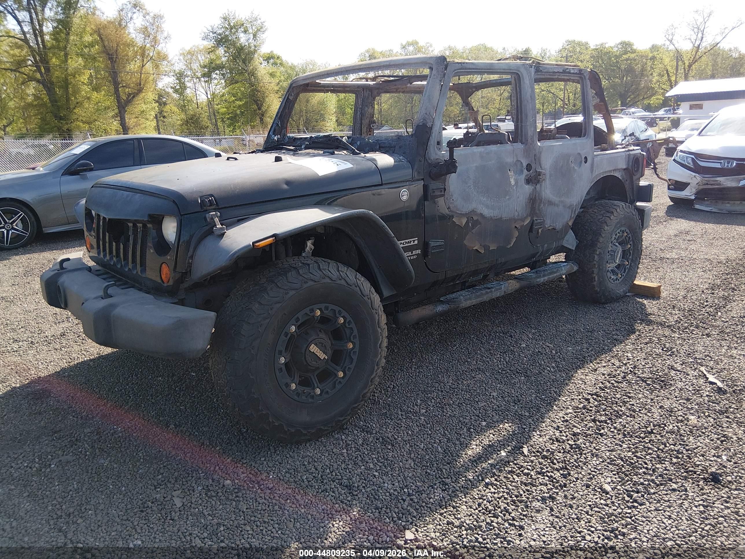 2012 Jeep Wrangler Unlimited Sport Black vin: 1C4BJWDGXCL212861