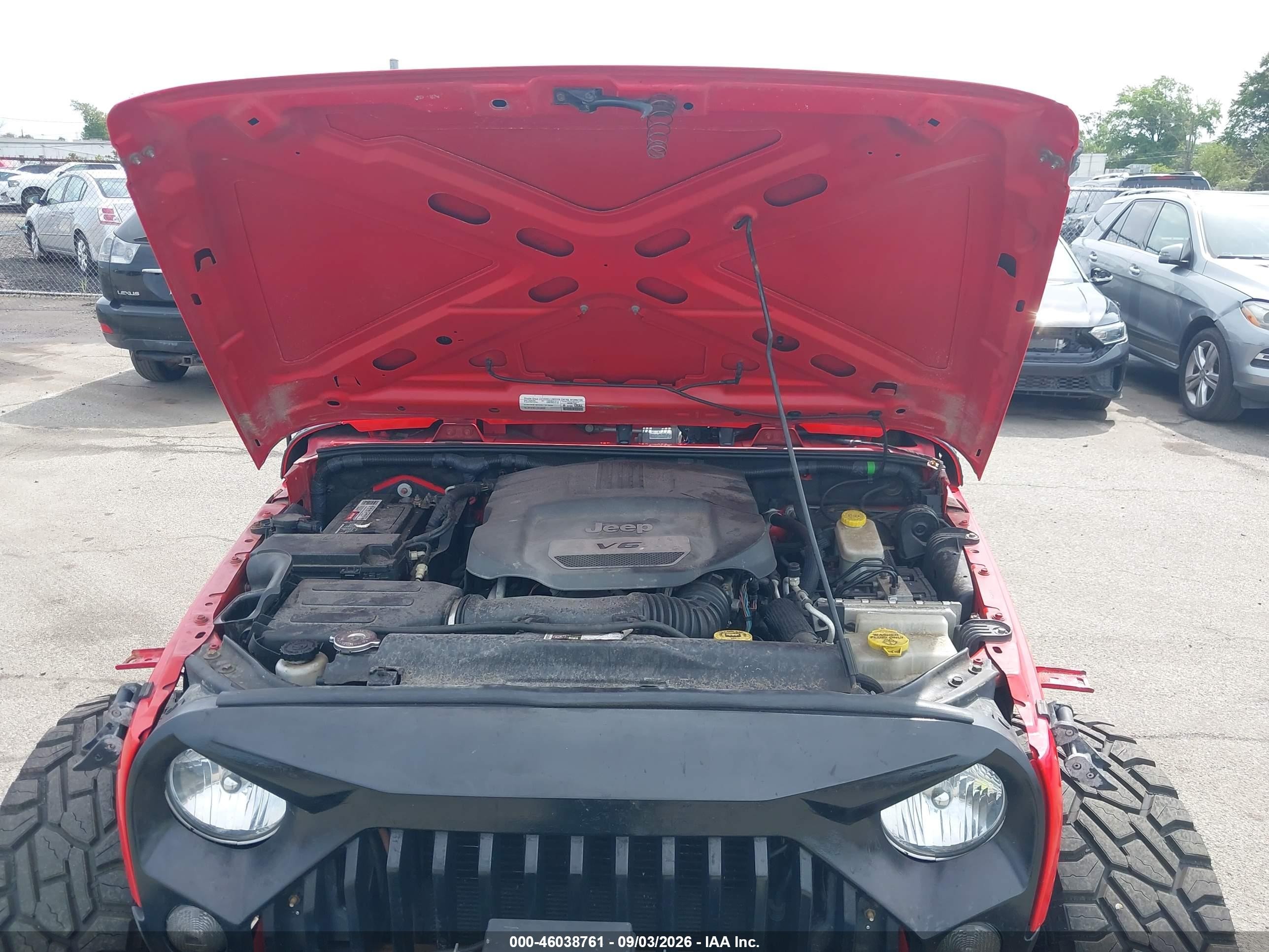 2015 Jeep Wrangler Unlimited Sport Red vin: 1C4BJWDGXFL555318