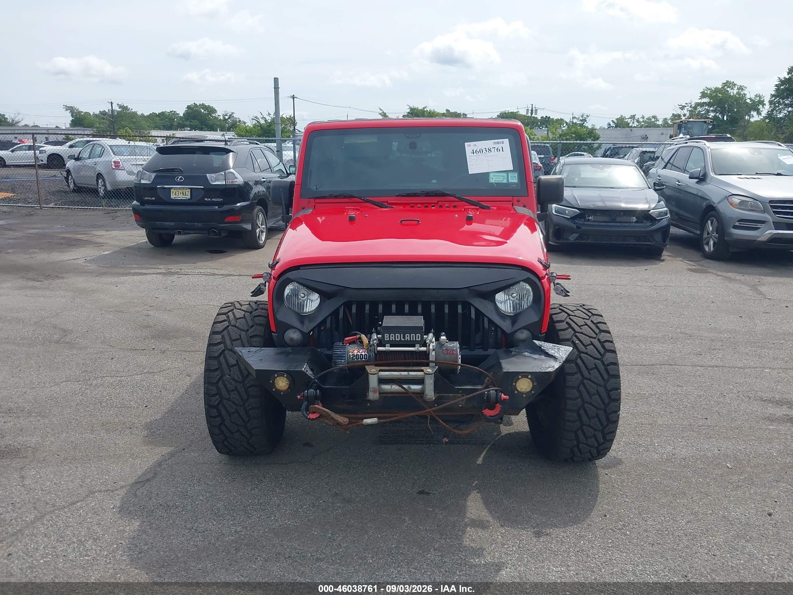2015 Jeep Wrangler Unlimited Sport Red vin: 1C4BJWDGXFL555318