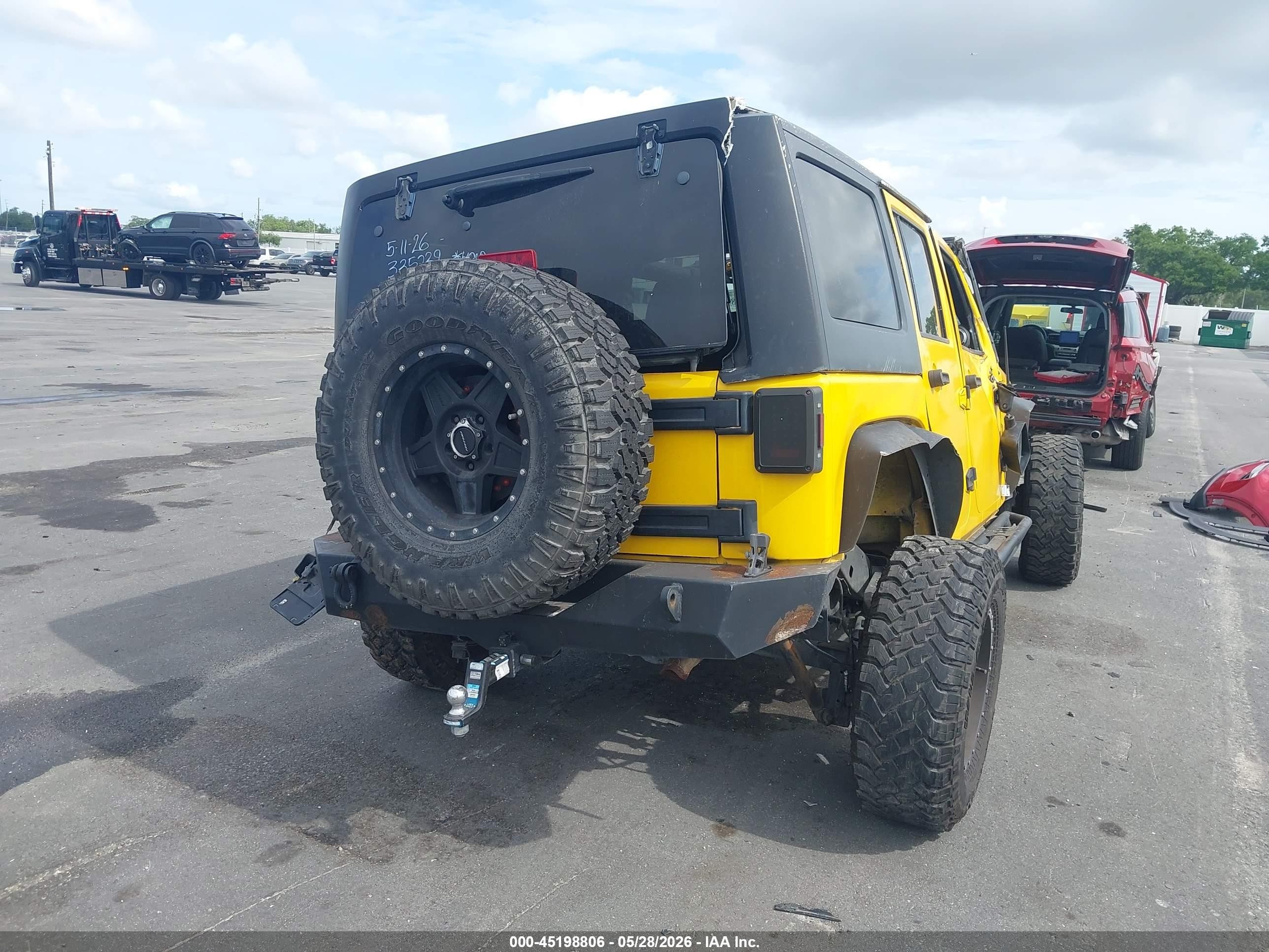 2015 Jeep Wrangler Unlimited Sport Yellow vin: 1C4BJWDGXFL609412