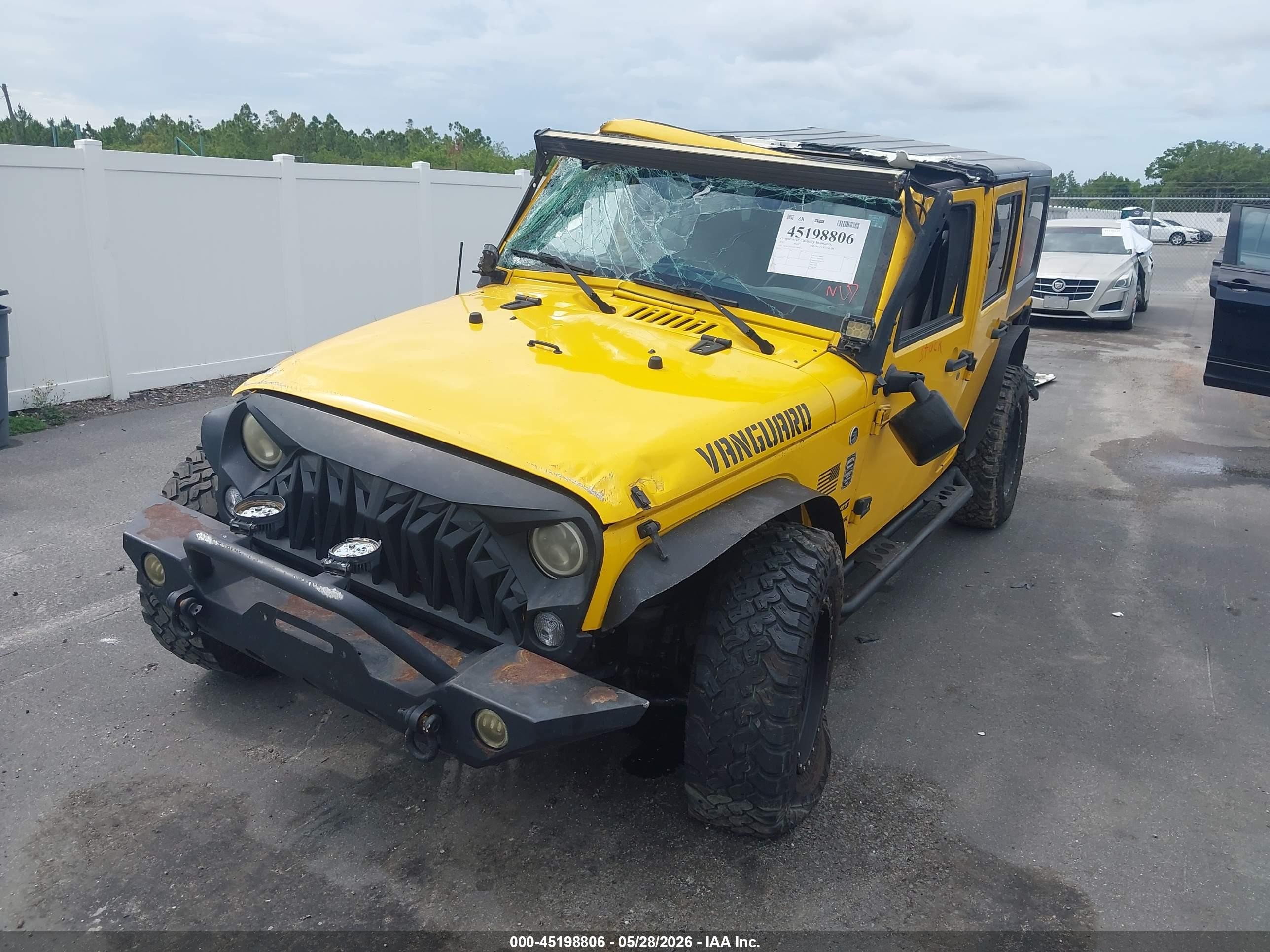 2015 Jeep Wrangler Unlimited Sport Yellow vin: 1C4BJWDGXFL609412