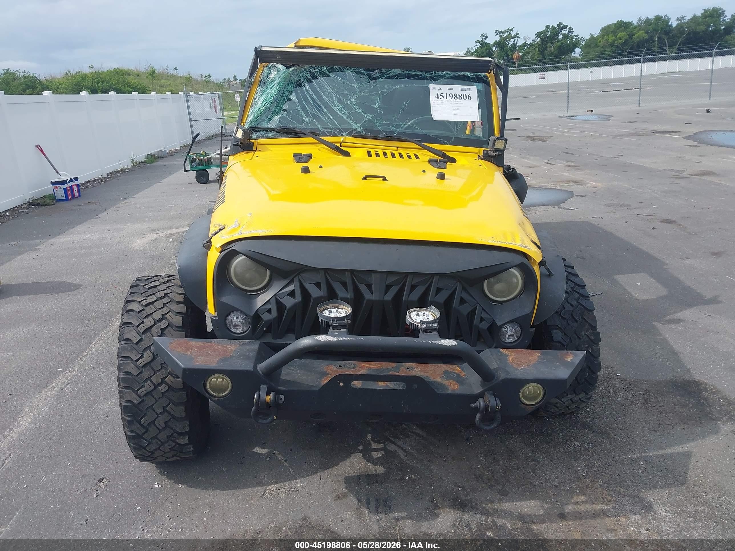 2015 Jeep Wrangler Unlimited Sport Yellow vin: 1C4BJWDGXFL609412