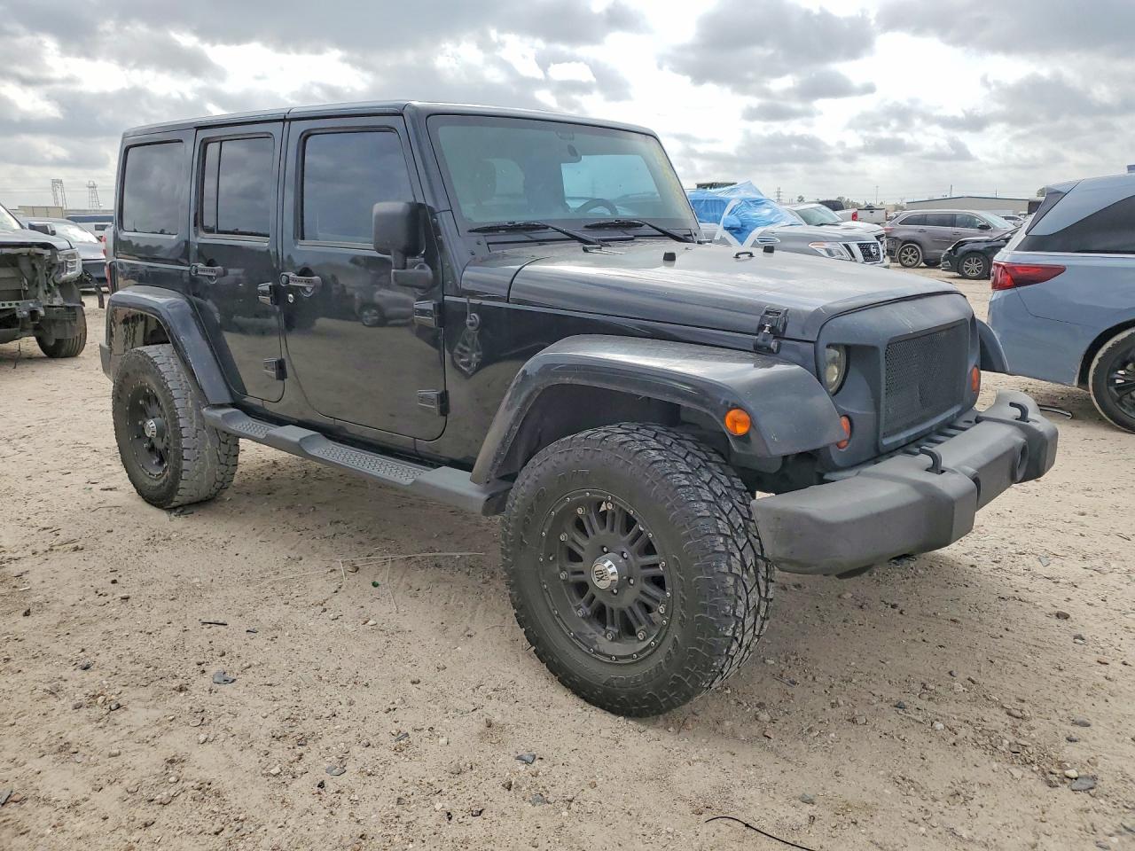2012 Jeep Wrangler Unlimited Sahara Black vin: 1C4BJWEG0CL168237