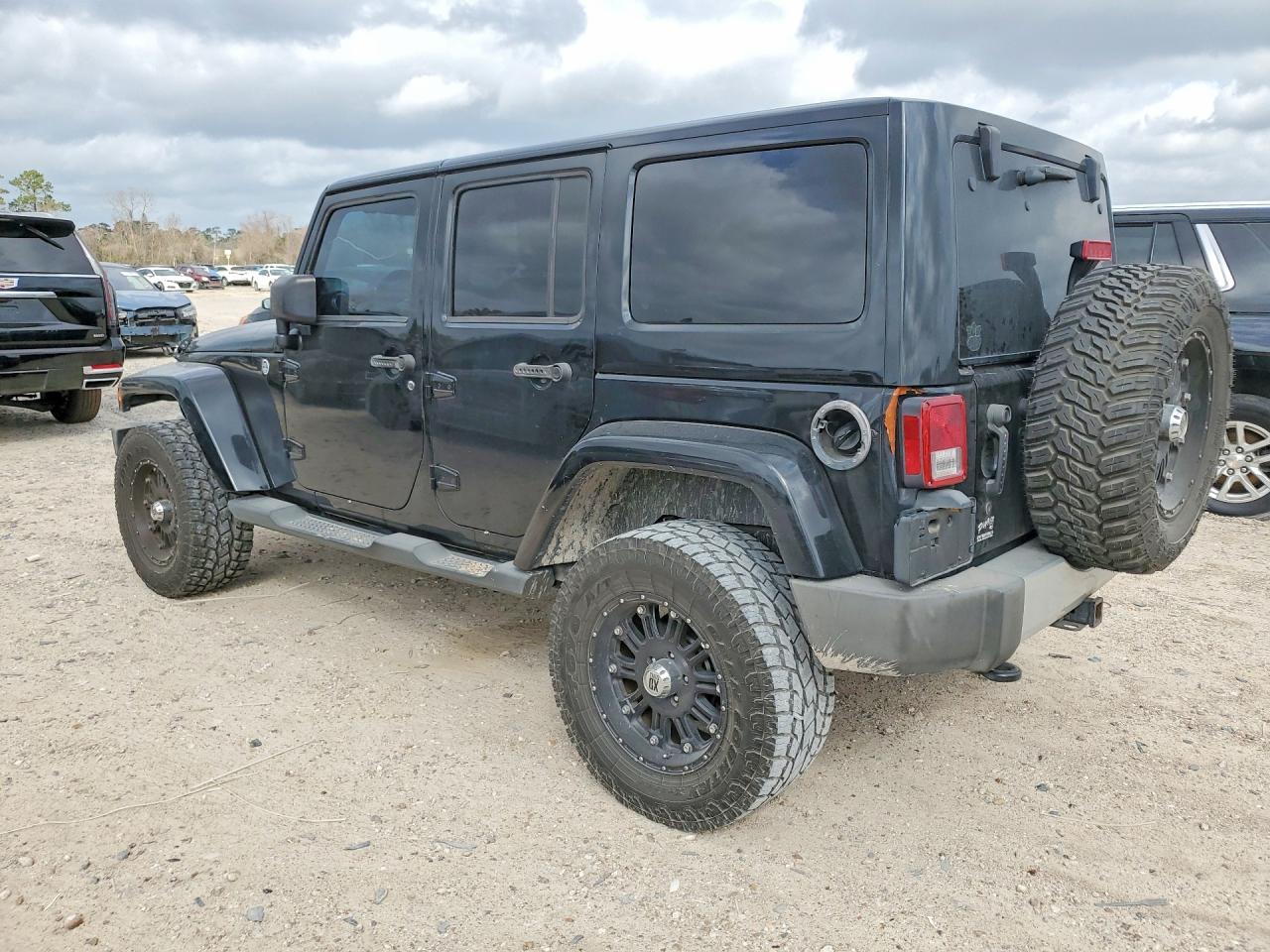 2012 Jeep Wrangler Unlimited Sahara Black vin: 1C4BJWEG0CL168237
