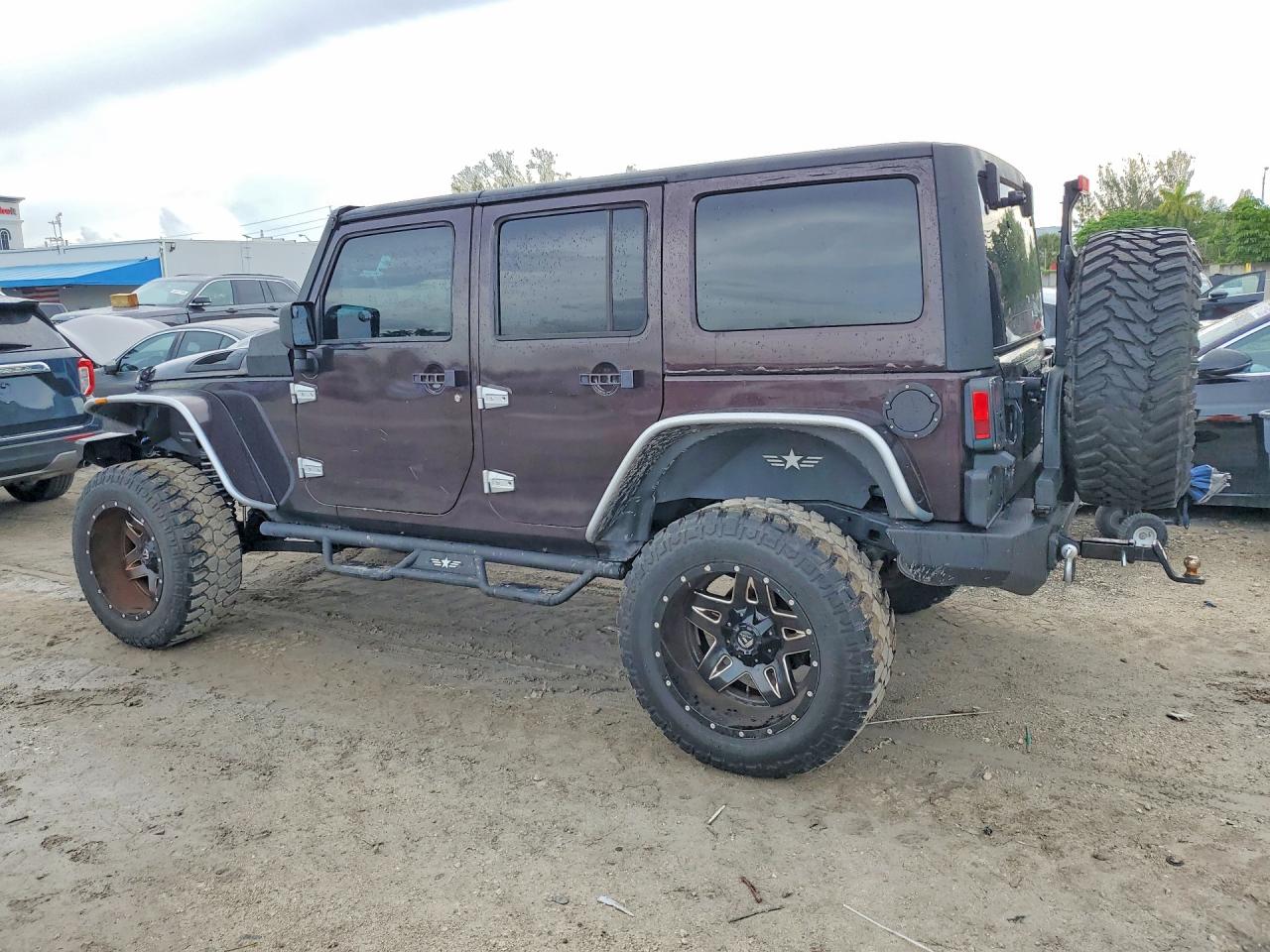2012 Jeep Wrangler Unlimited Sahara Бордовый vin: 1C4BJWEG0CL243793