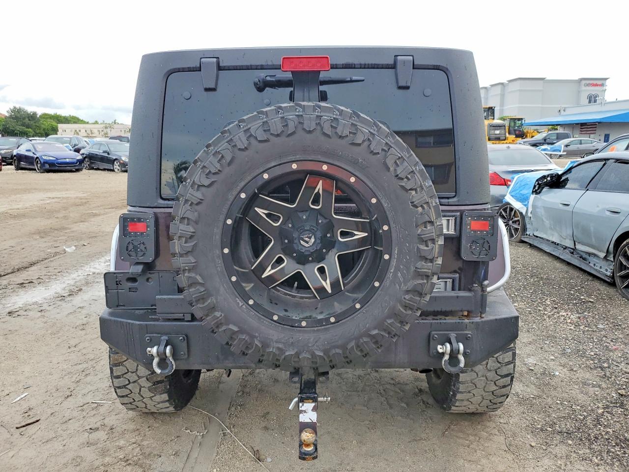 2012 Jeep Wrangler Unlimited Sahara Бордовый vin: 1C4BJWEG0CL243793