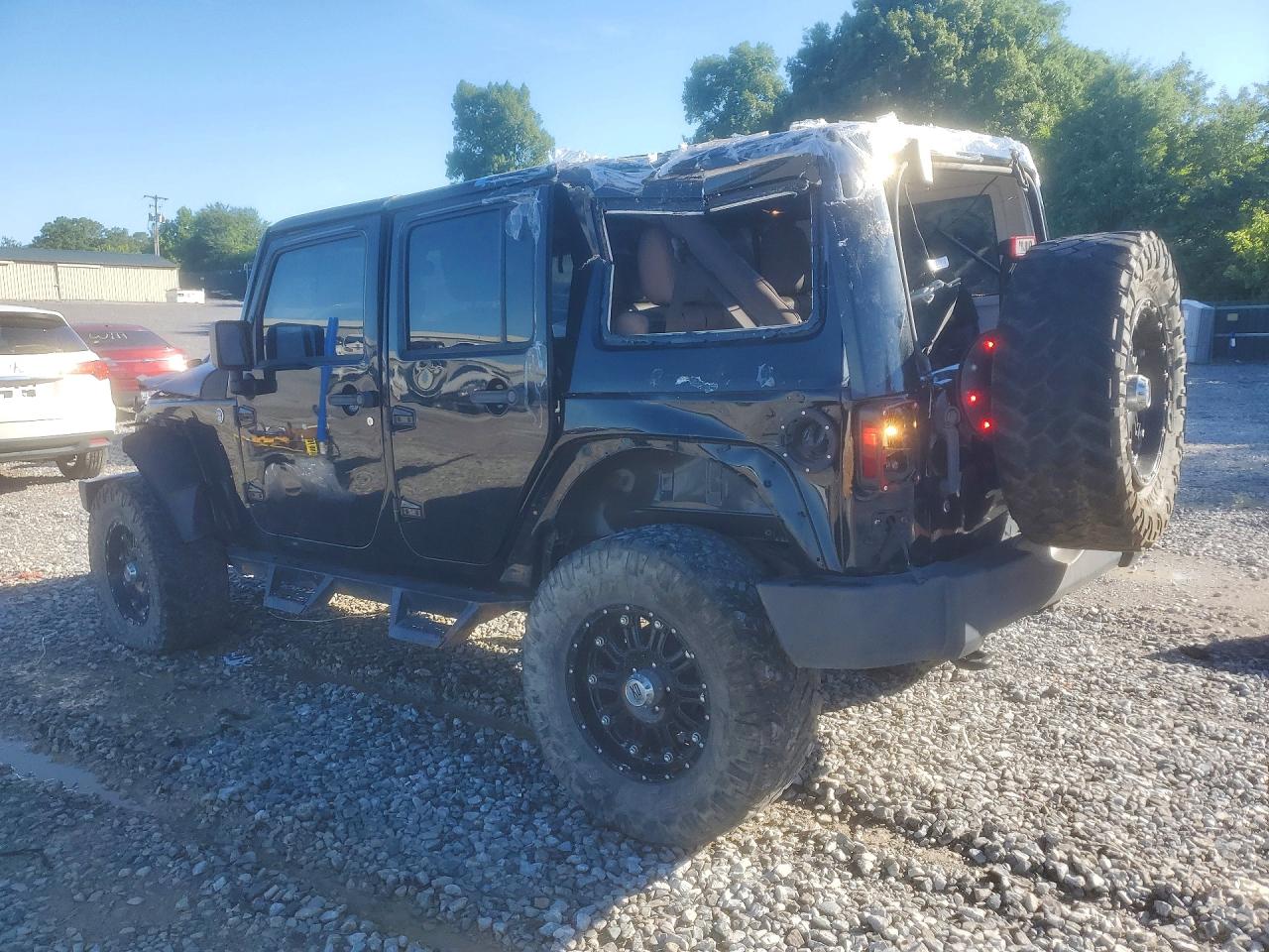 2014 Jeep Wrangler Unlimited Sahara Black vin: 1C4BJWEG0EL135452