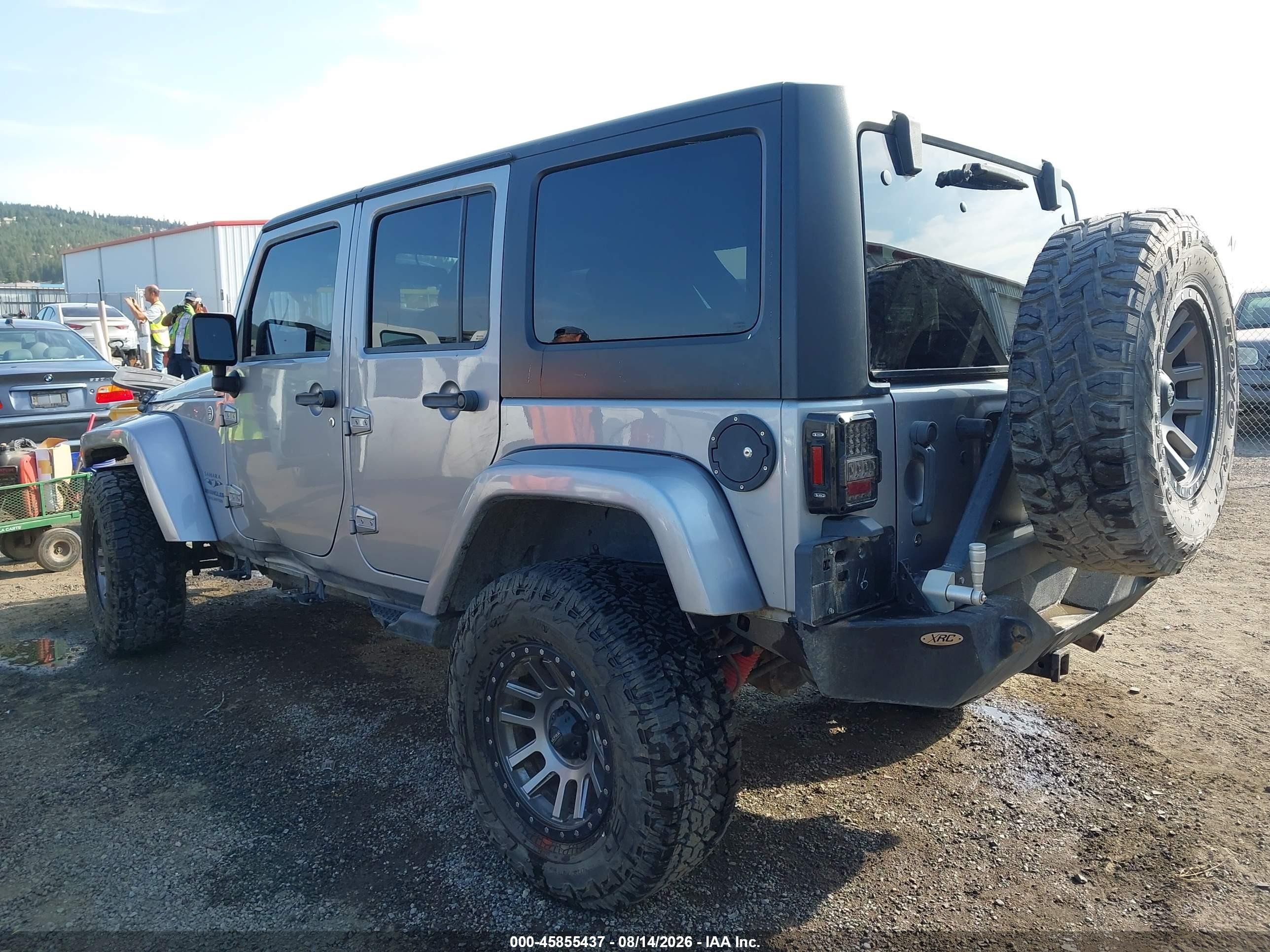 2014 Jeep Wrangler Unlimited Sahara Silver vin: 1C4BJWEG0EL173425