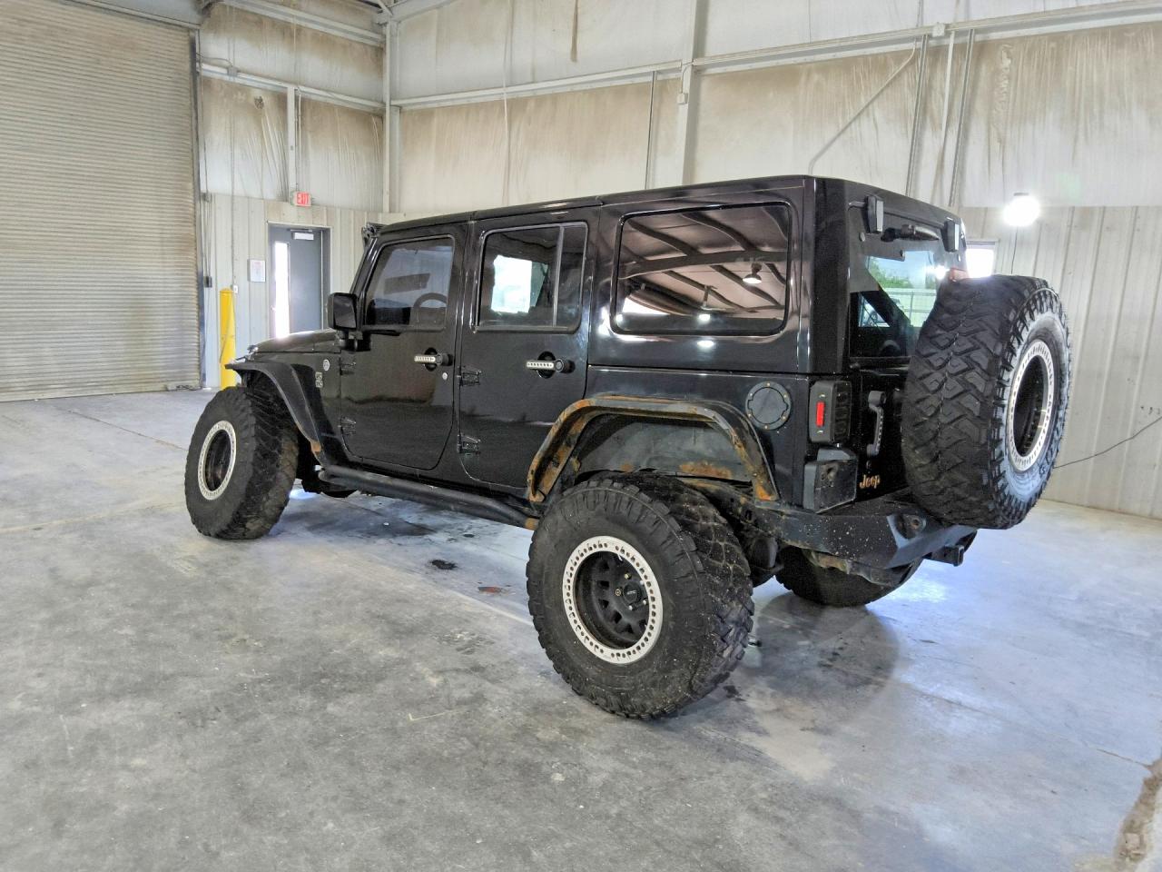 2014 Jeep Wrangler Unlimited Sahara Black vin: 1C4BJWEG0EL190211
