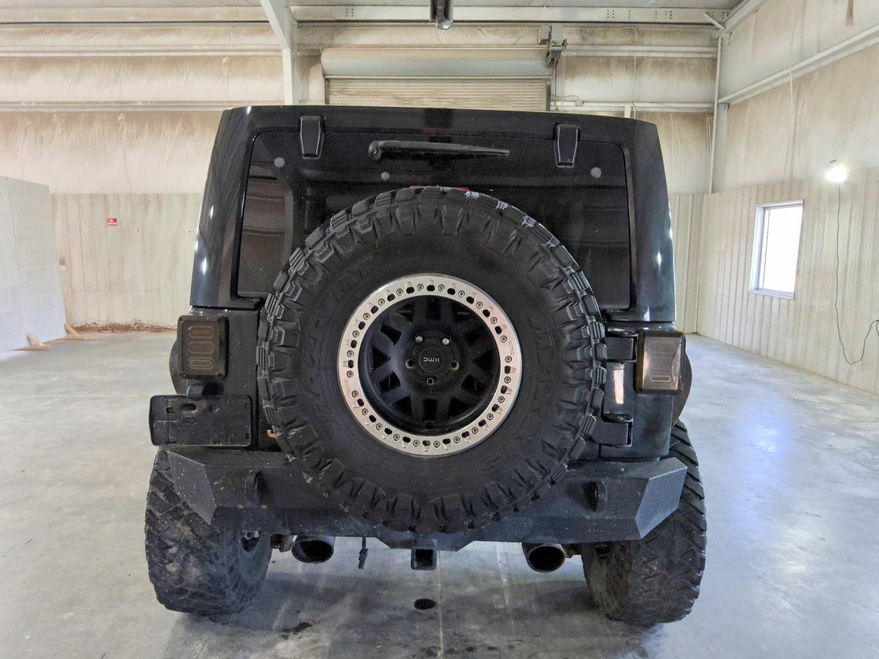 2014 Jeep Wrangler Unlimited Sahara Black vin: 1C4BJWEG0EL190211