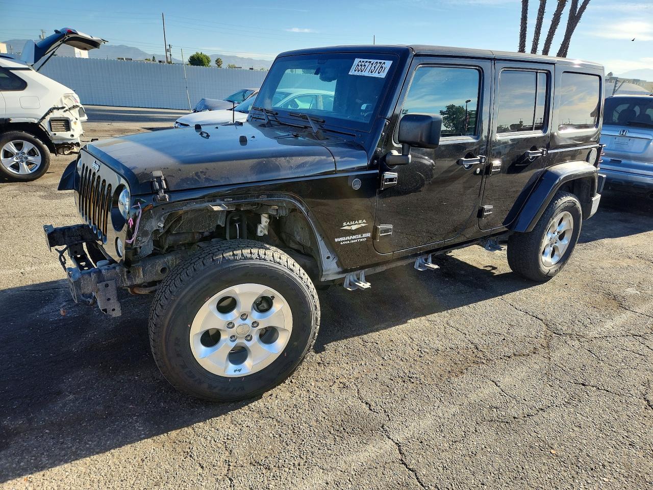 2015 Jeep Wrangler Unlimited Sahara Black vin: 1C4BJWEG0FL690547