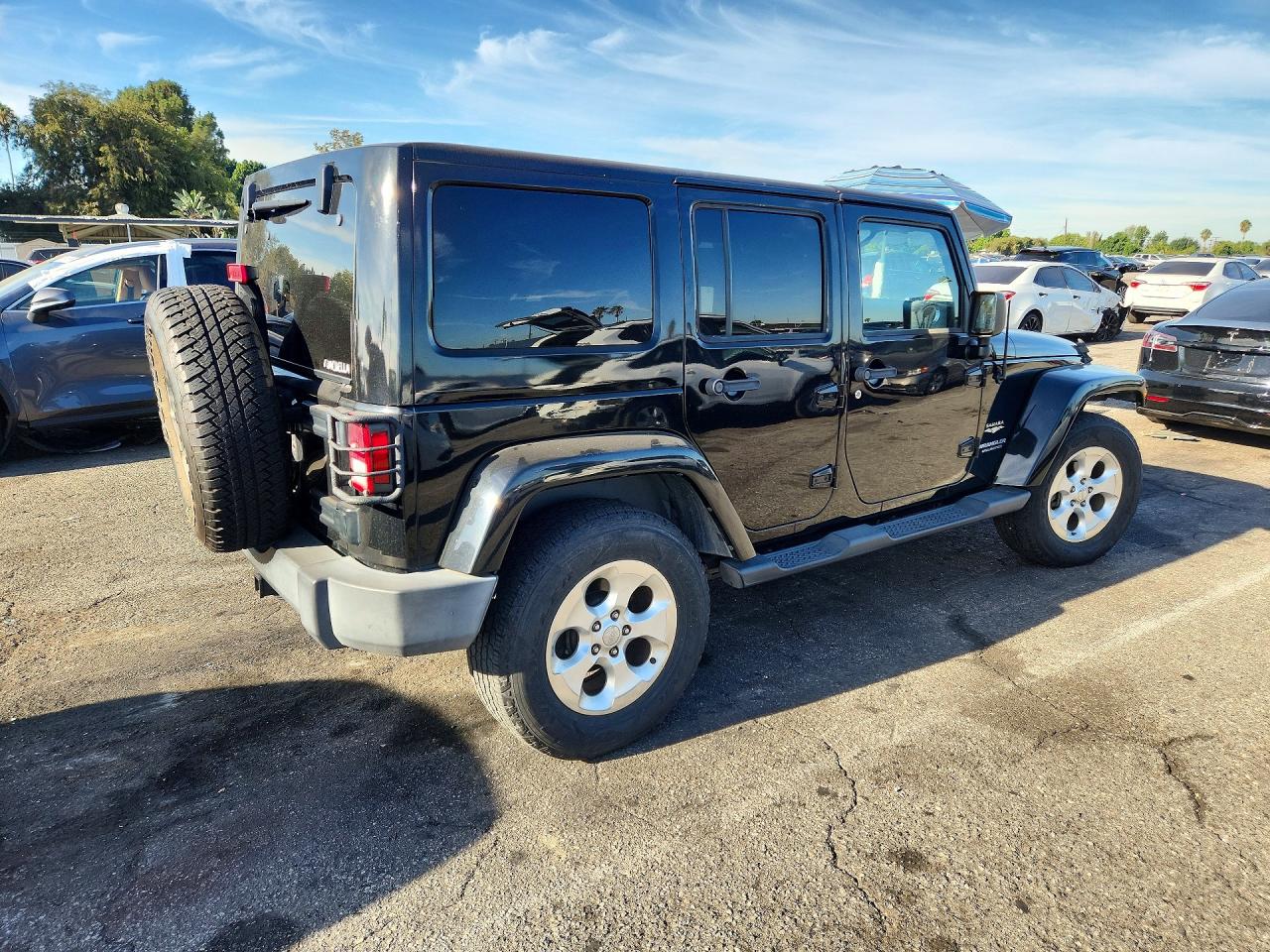 2015 Jeep Wrangler Unlimited Sahara Black vin: 1C4BJWEG0FL690547