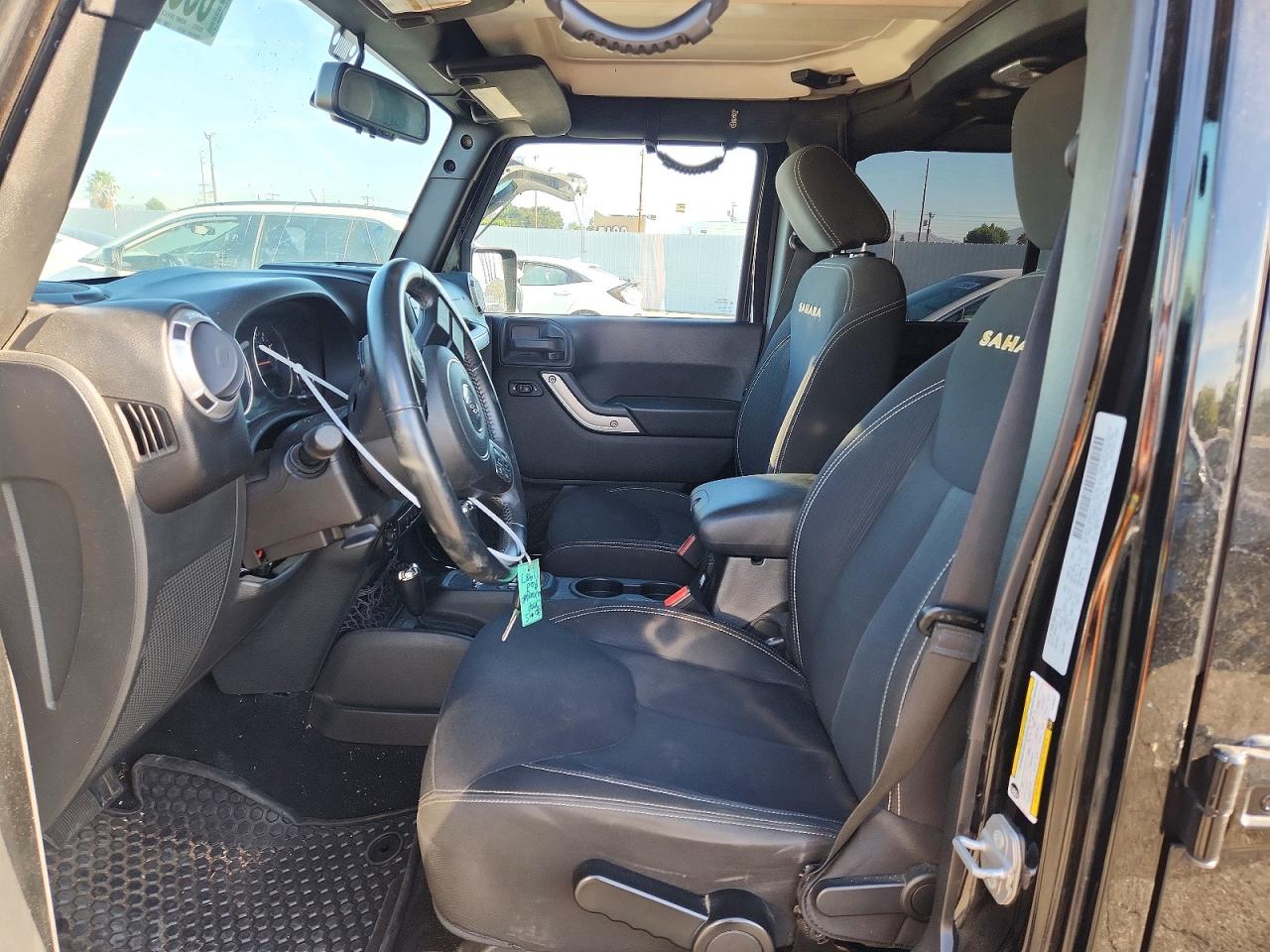 2015 Jeep Wrangler Unlimited Sahara Black vin: 1C4BJWEG0FL690547
