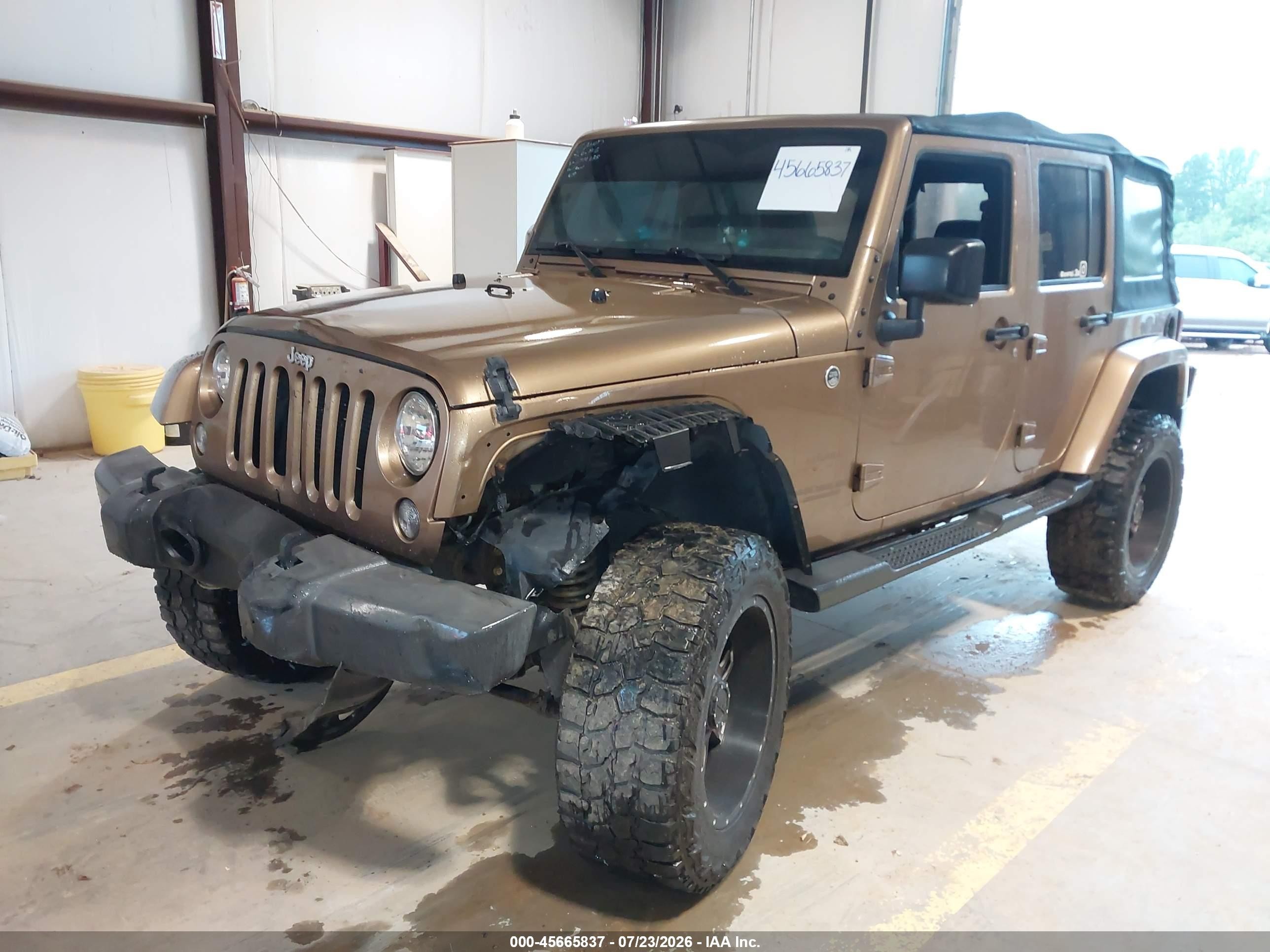 2015 Jeep Wrangler Unlimited Sahara Gold vin: 1C4BJWEG1FL624038