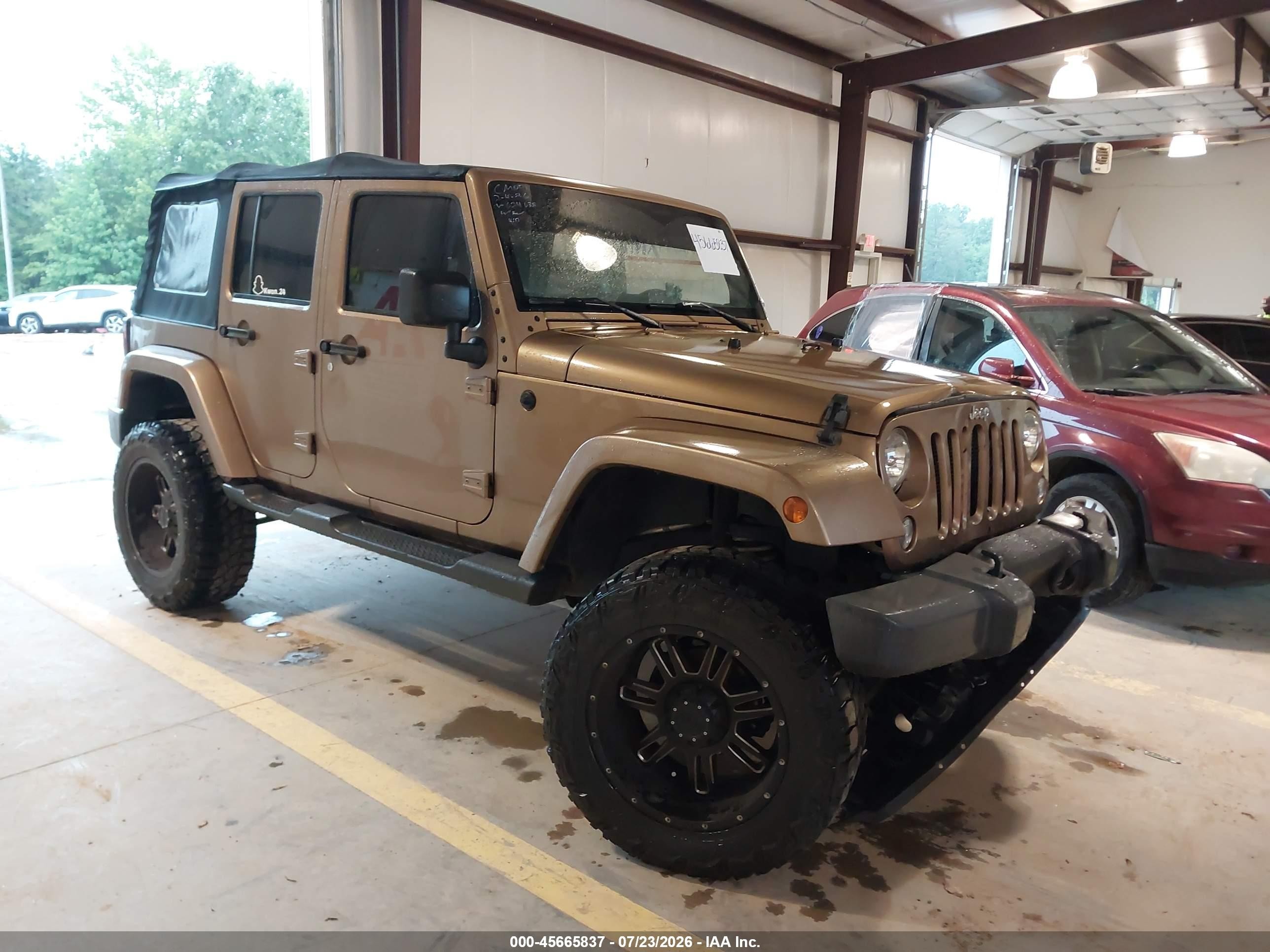 2015 Jeep Wrangler Unlimited Sahara Gold vin: 1C4BJWEG1FL624038
