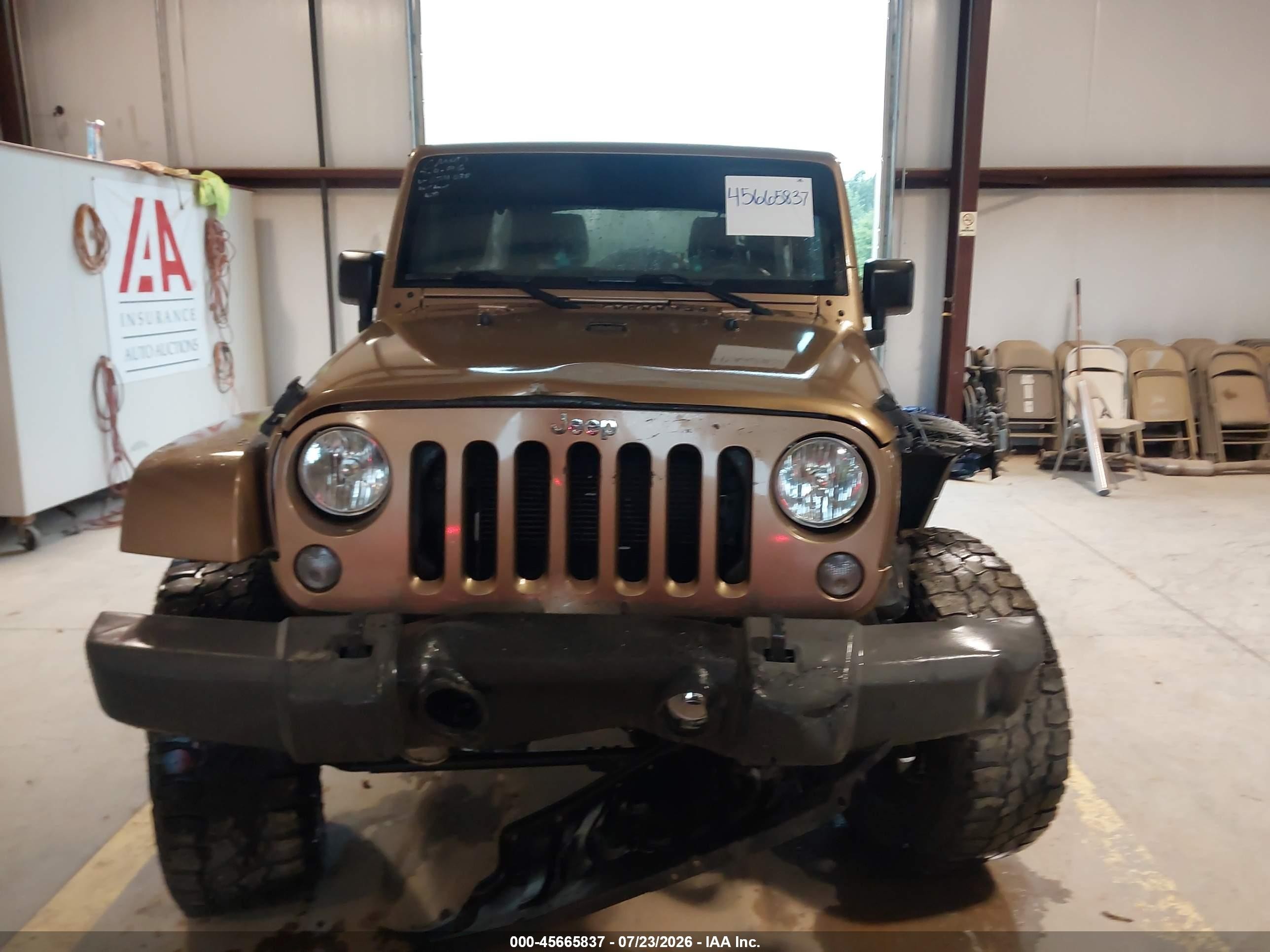 2015 Jeep Wrangler Unlimited Sahara Gold vin: 1C4BJWEG1FL624038