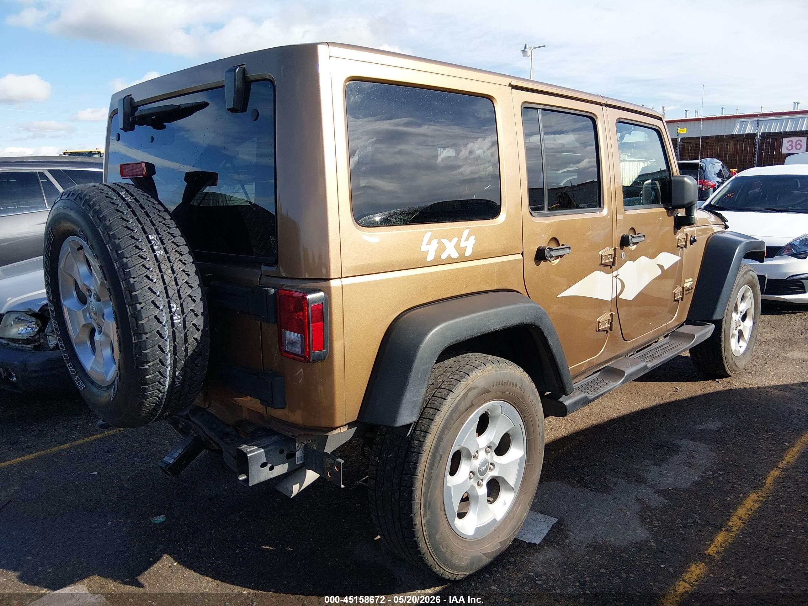 2015 Jeep Wrangler Unlimited Sahara Gold vin: 1C4BJWEG1FL676902