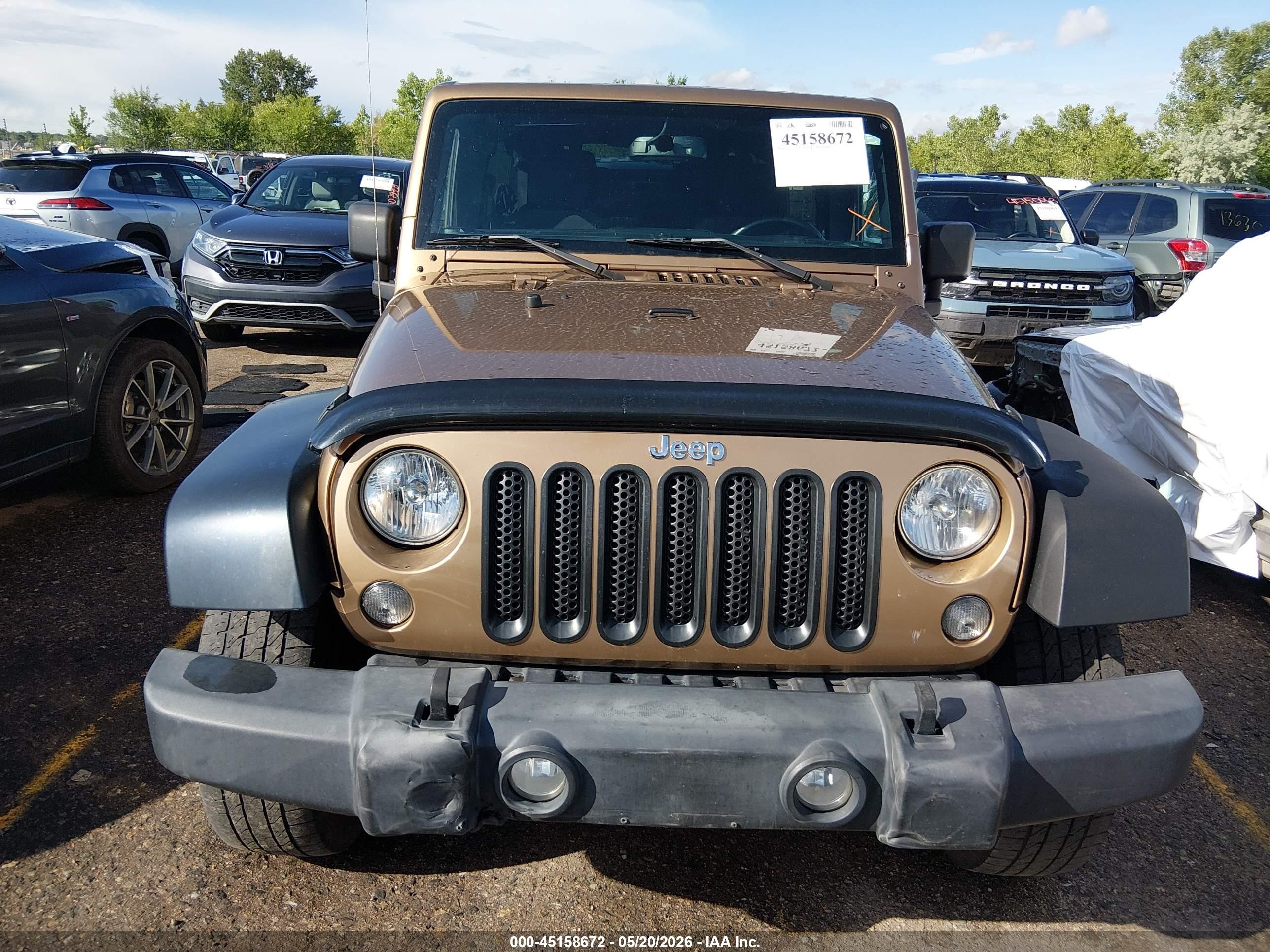 2015 Jeep Wrangler Unlimited Sahara Gold vin: 1C4BJWEG1FL676902