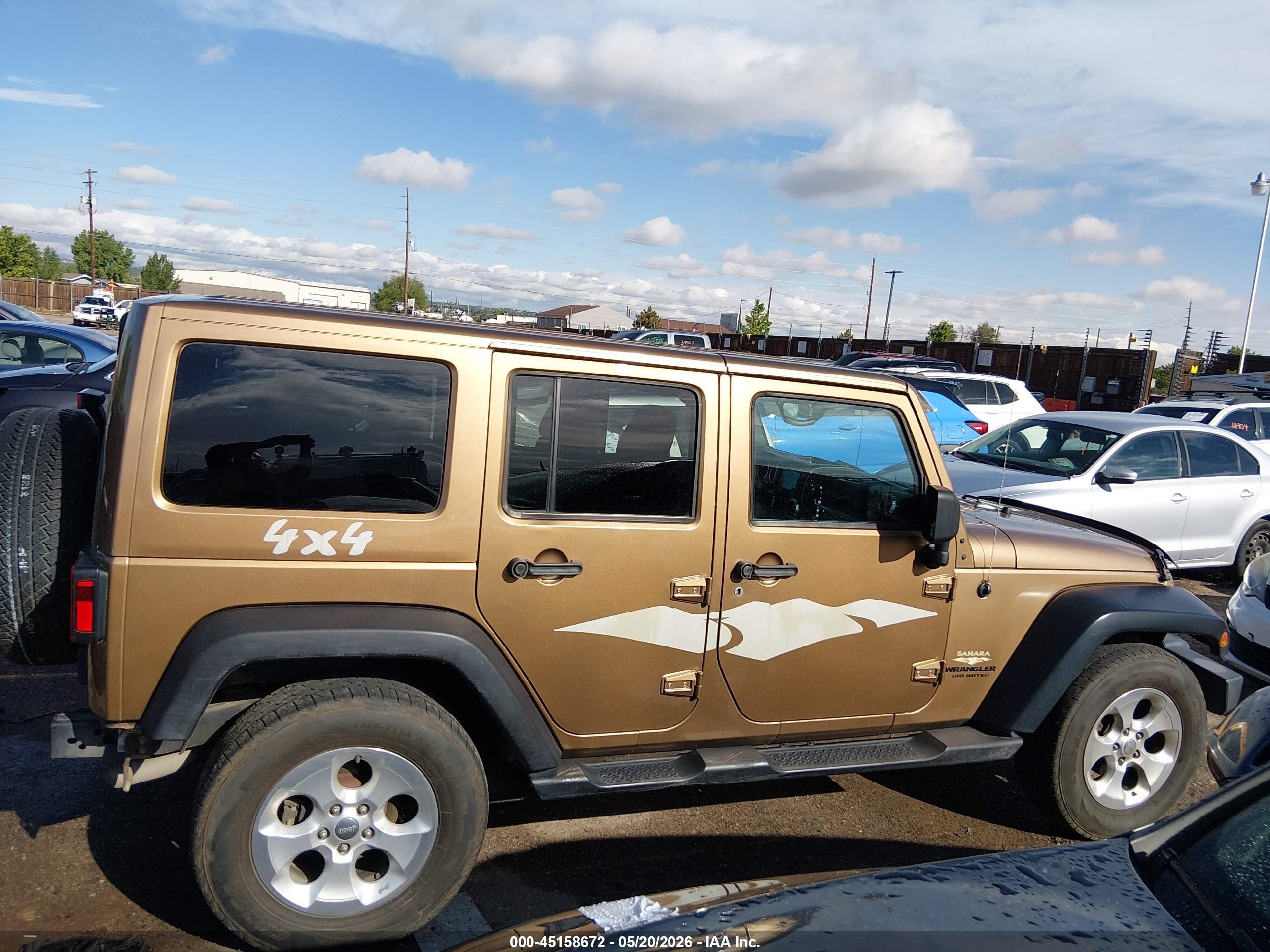 2015 Jeep Wrangler Unlimited Sahara Gold vin: 1C4BJWEG1FL676902