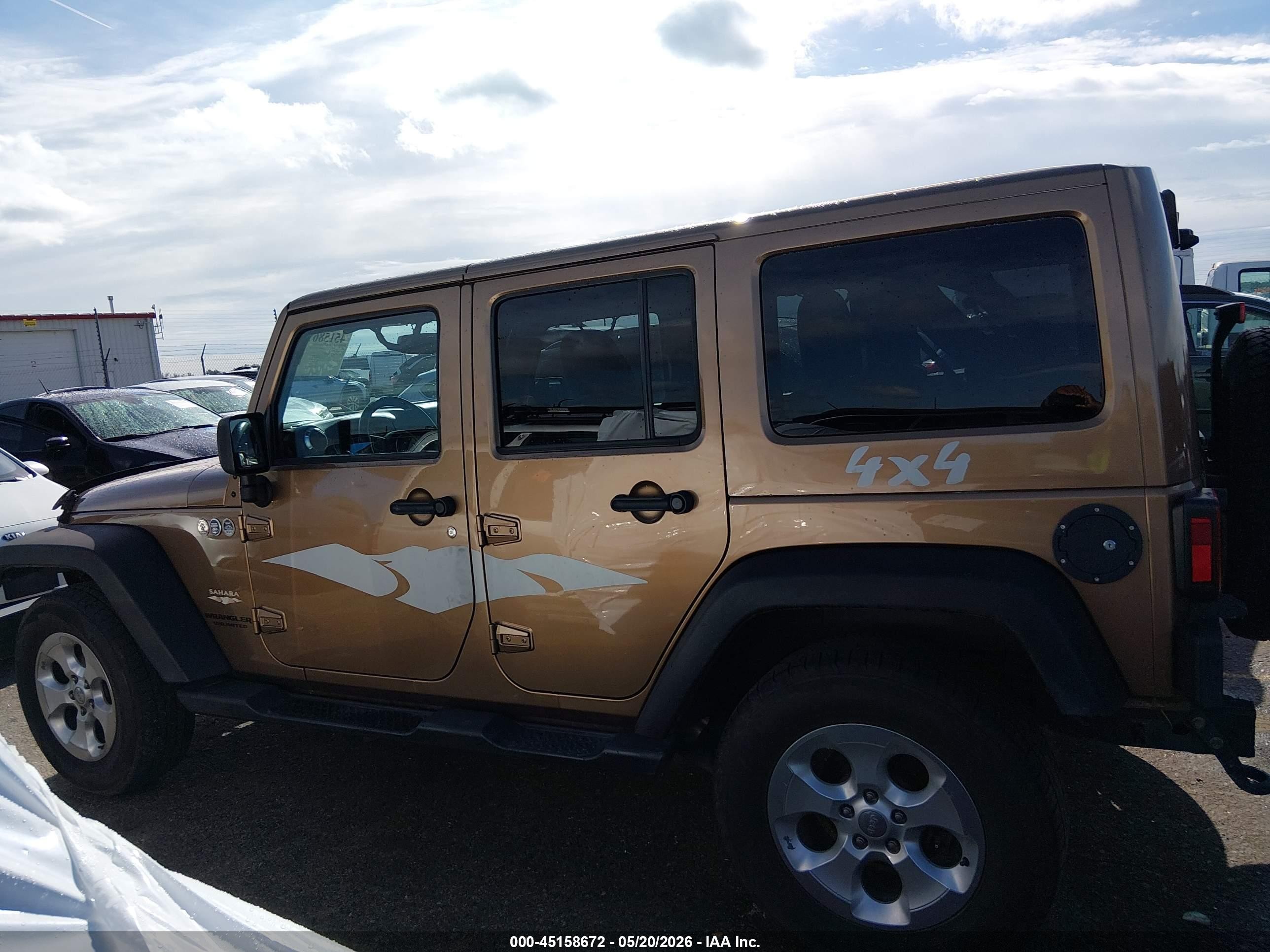 2015 Jeep Wrangler Unlimited Sahara Gold vin: 1C4BJWEG1FL676902