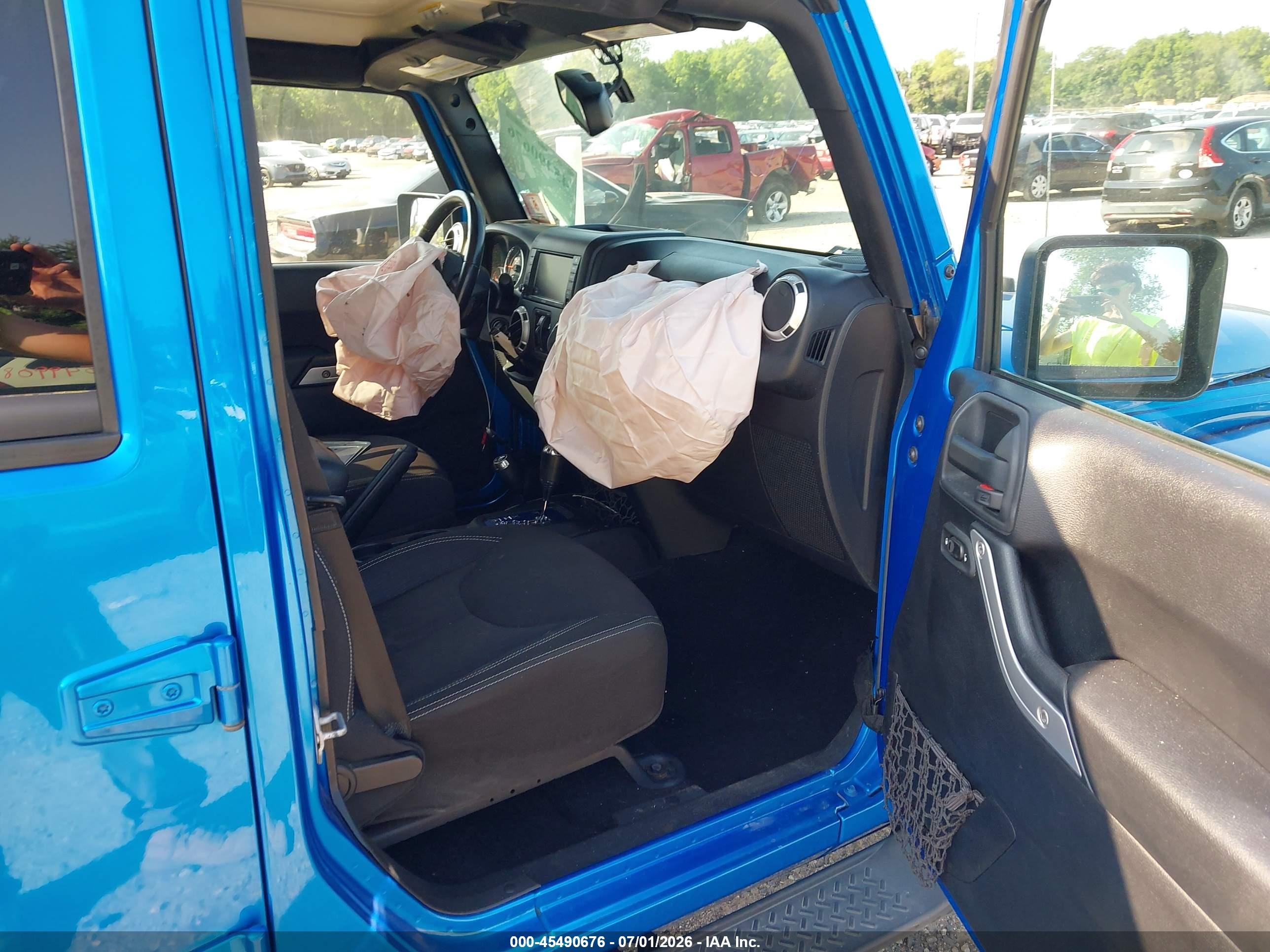 2015 Jeep Wrangler Unlimited Sahara Blue vin: 1C4BJWEG1FL678620