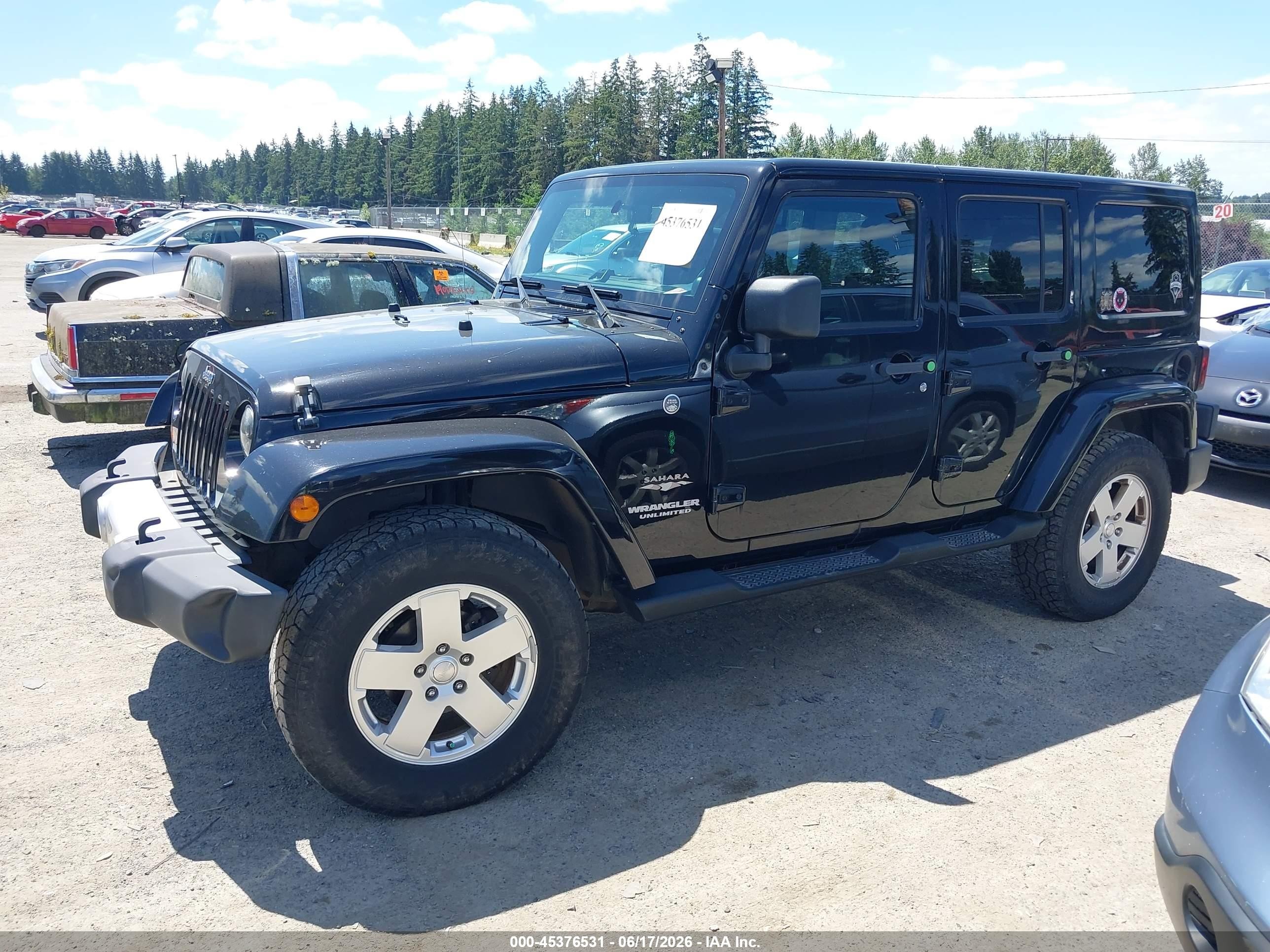 2012 Jeep Wrangler Unlimited Sahara Черный vin: 1C4BJWEG2CL278643