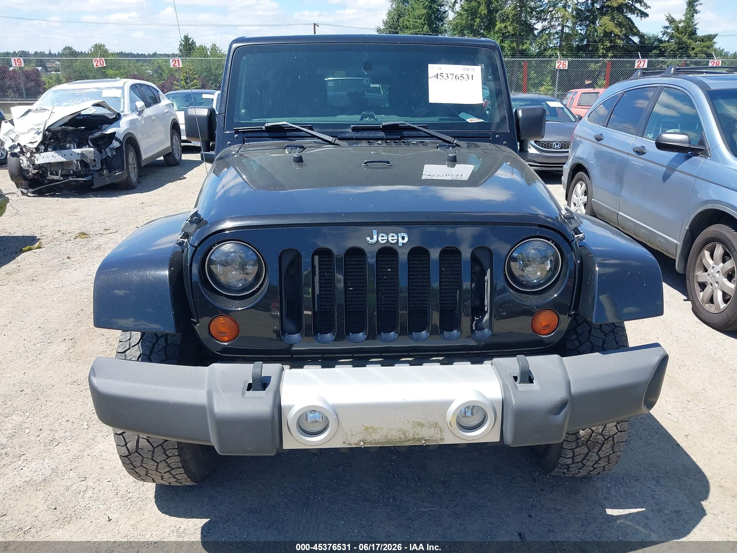 2012 Jeep Wrangler Unlimited Sahara Черный vin: 1C4BJWEG2CL278643