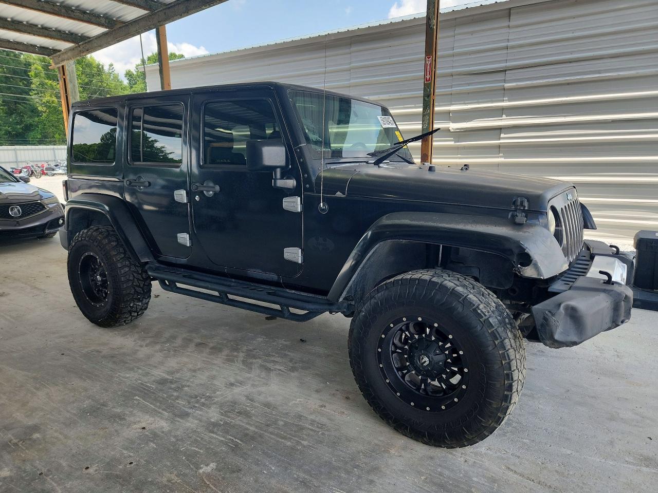 2015 Jeep Wrangler Unlimited Sahara Black vin: 1C4BJWEG2FL524143