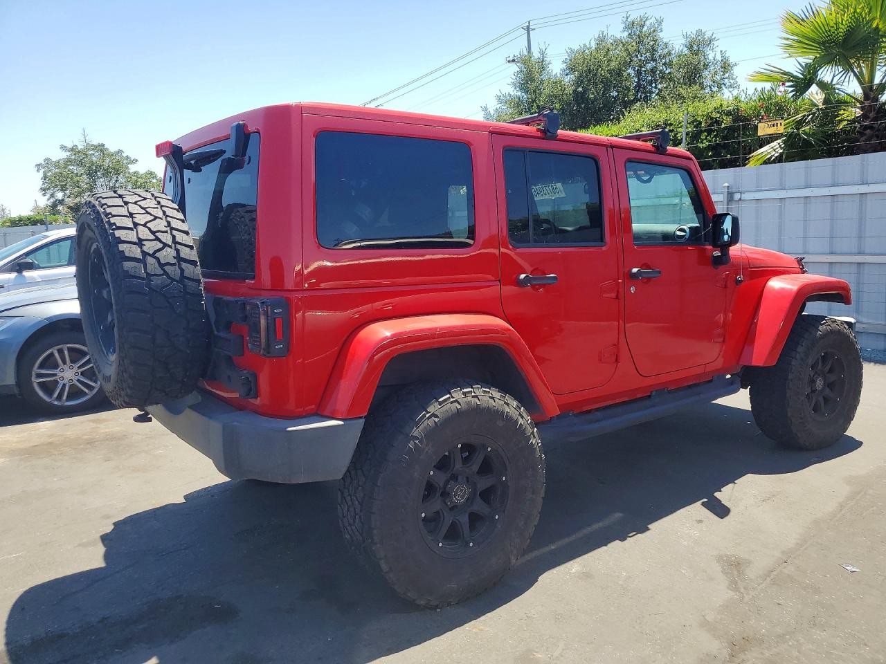 2015 Jeep Wrangler Unlimited Sahara Red vin: 1C4BJWEG2FL600458
