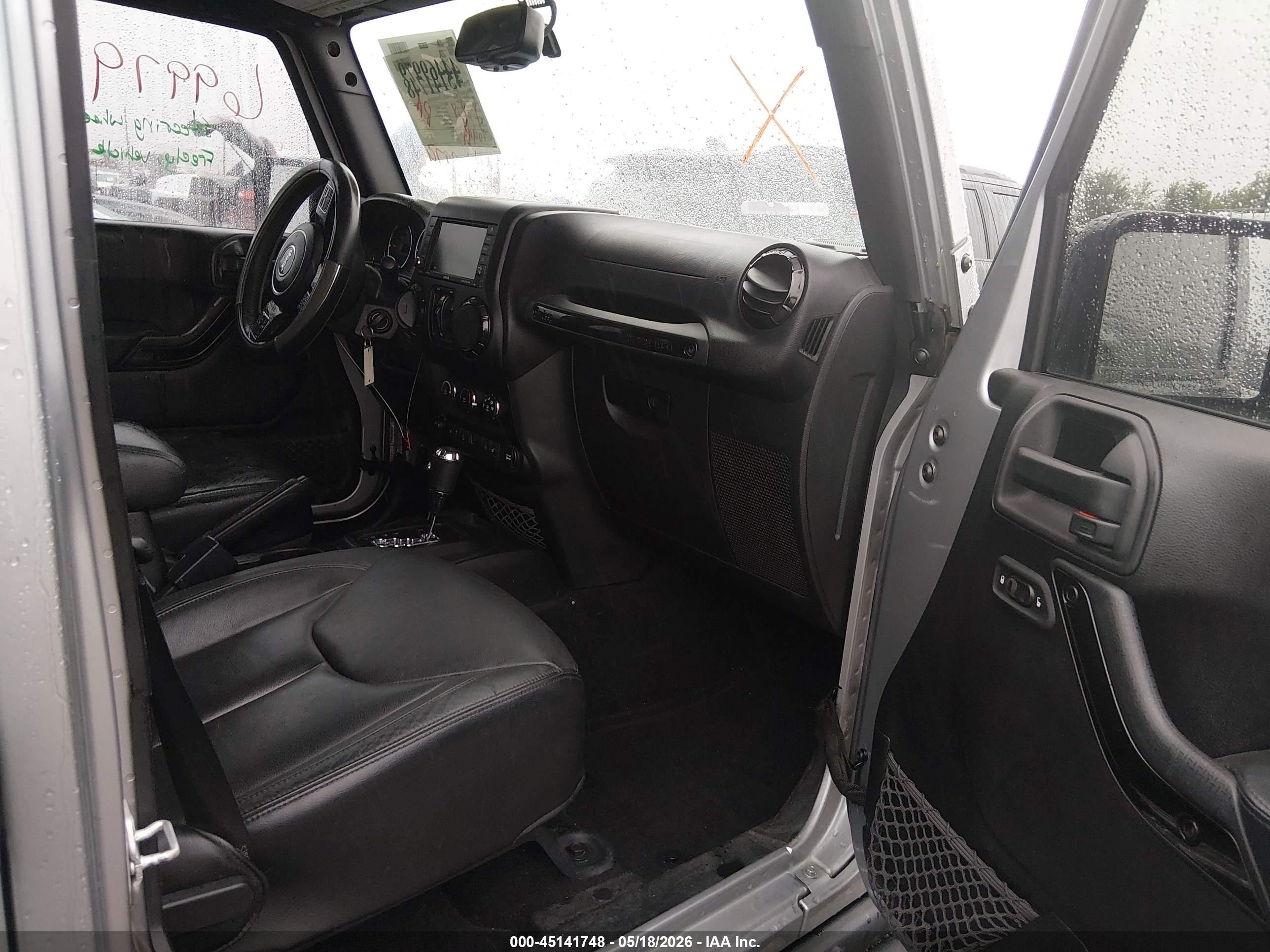 2015 Jeep Wrangler Unlimited Altitude Black vin: 1C4BJWEG2FL767628