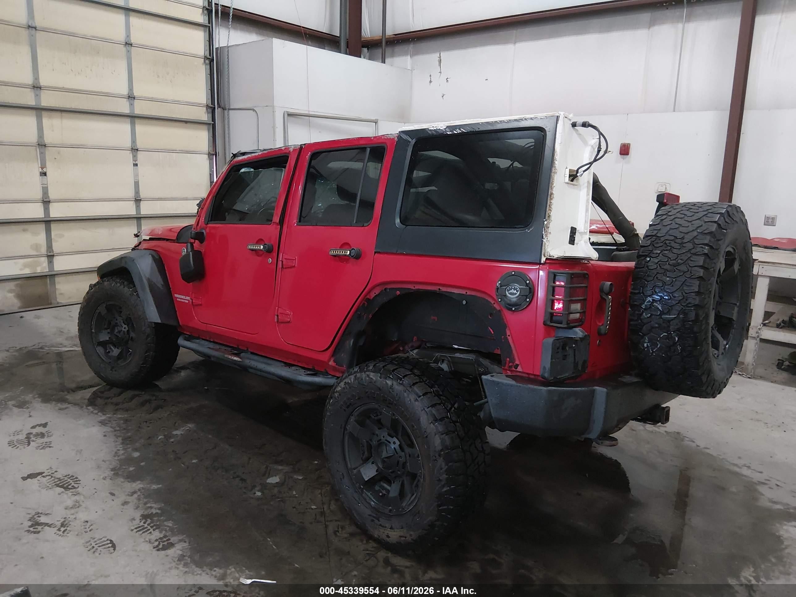 2012 Jeep Wrangler Unlimited Sahara Red vin: 1C4BJWEG3CL130923