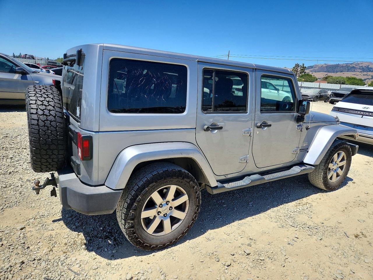 2015 Jeep Wrangler Unlimited Sahara Silver vin: 1C4BJWEG3FL578616