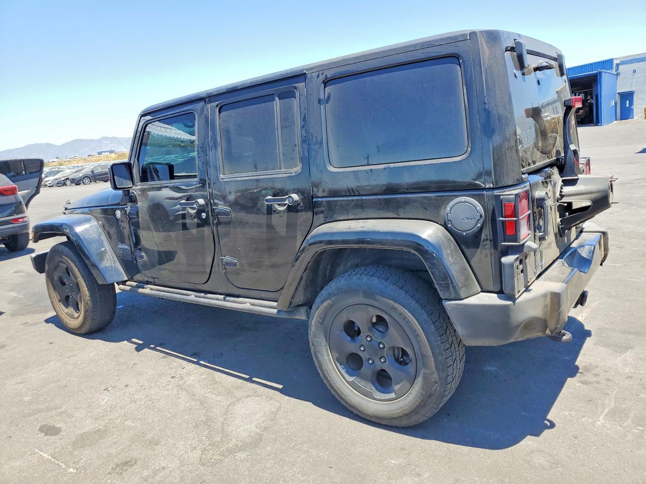 2015 Jeep Wrangler Unlimited Sahara Black vin: 1C4BJWEG4FL703560