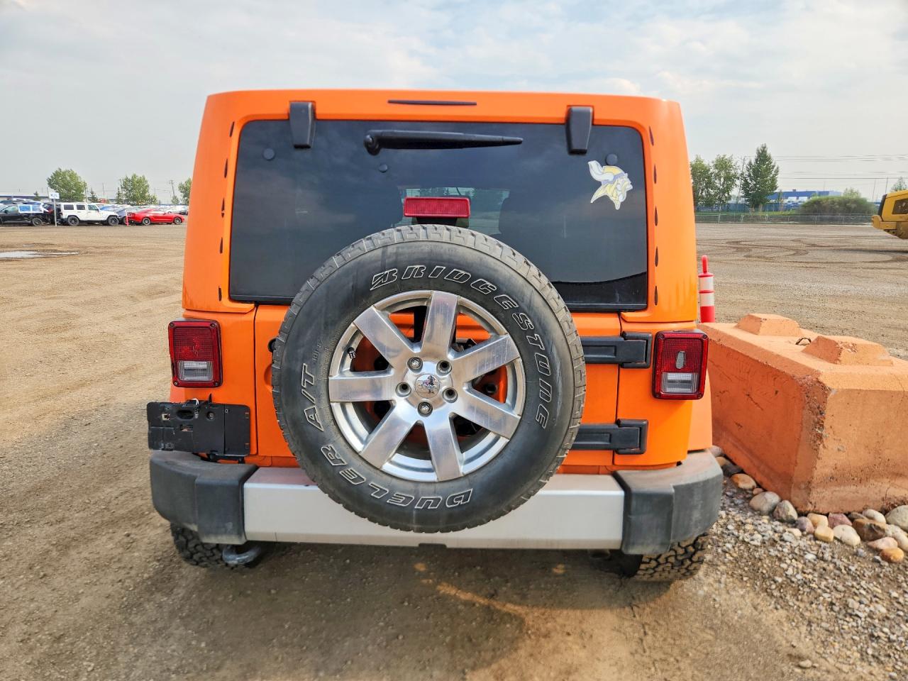 2013 Jeep Wrangler Unlimited Sahara Orange vin: 1C4BJWEG5DL537630