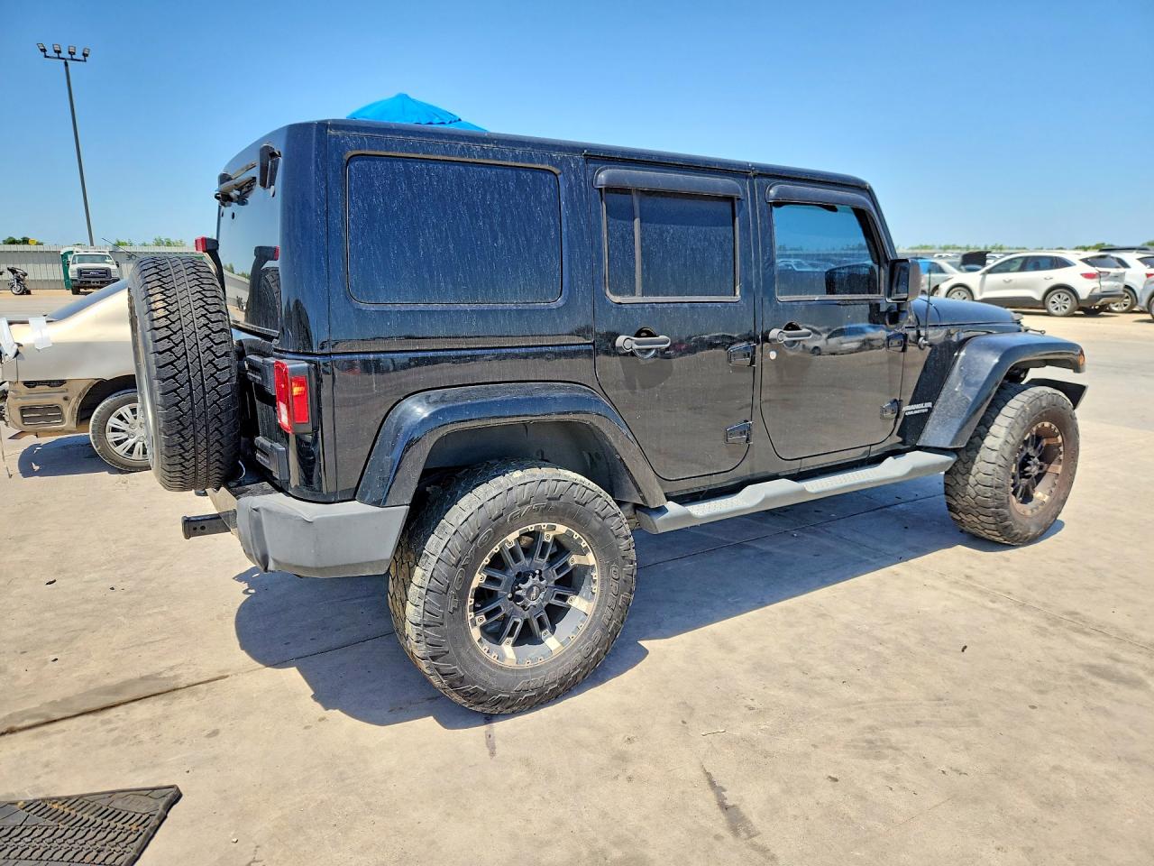 2012 Jeep Wrangler Unlimited Sahara Black vin: 1C4BJWEG6CL255043