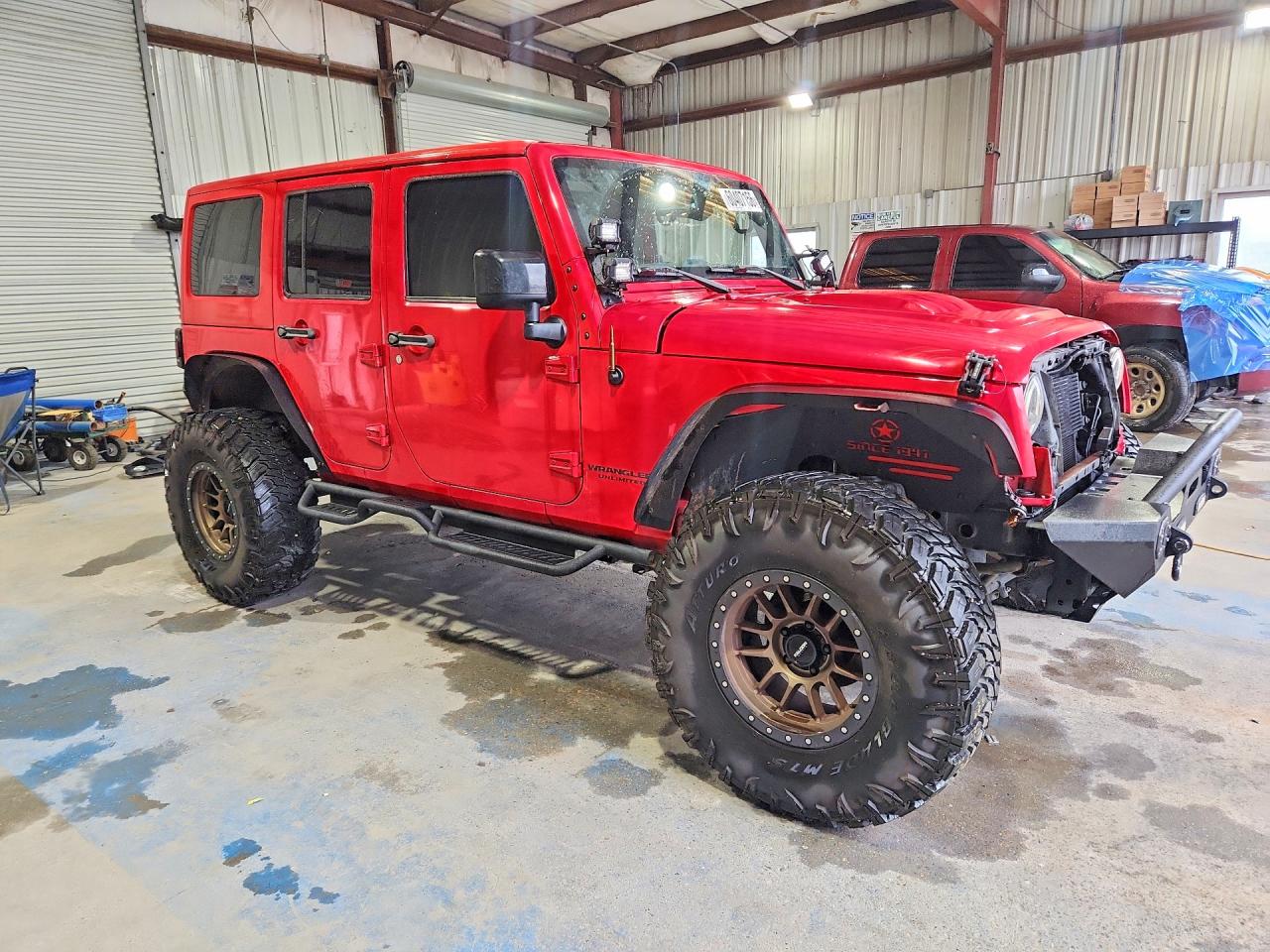 2015 Jeep Wrangler Unlimited Sahara Red vin: 1C4BJWEG6FL688558