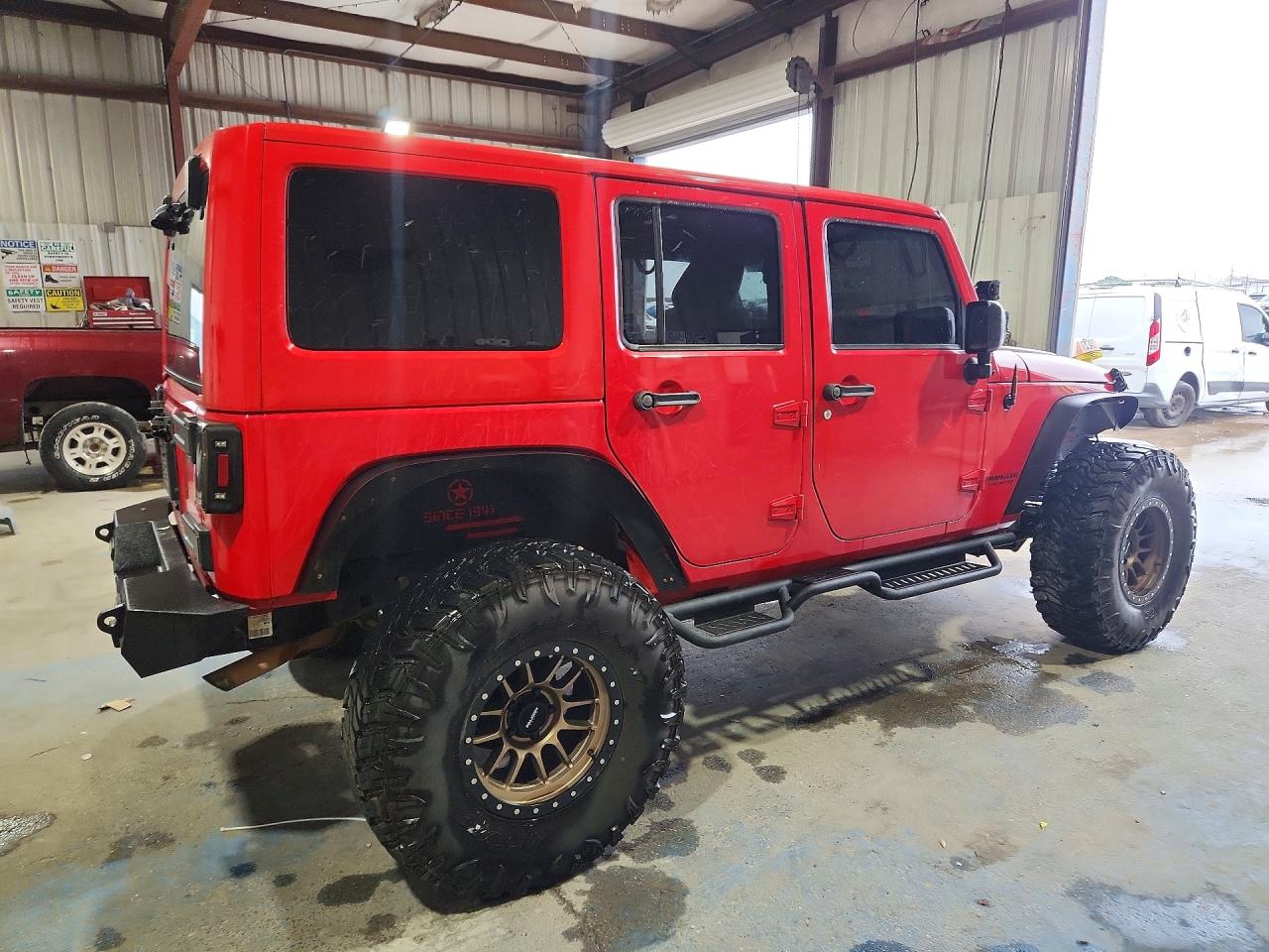 2015 Jeep Wrangler Unlimited Sahara Red vin: 1C4BJWEG6FL688558